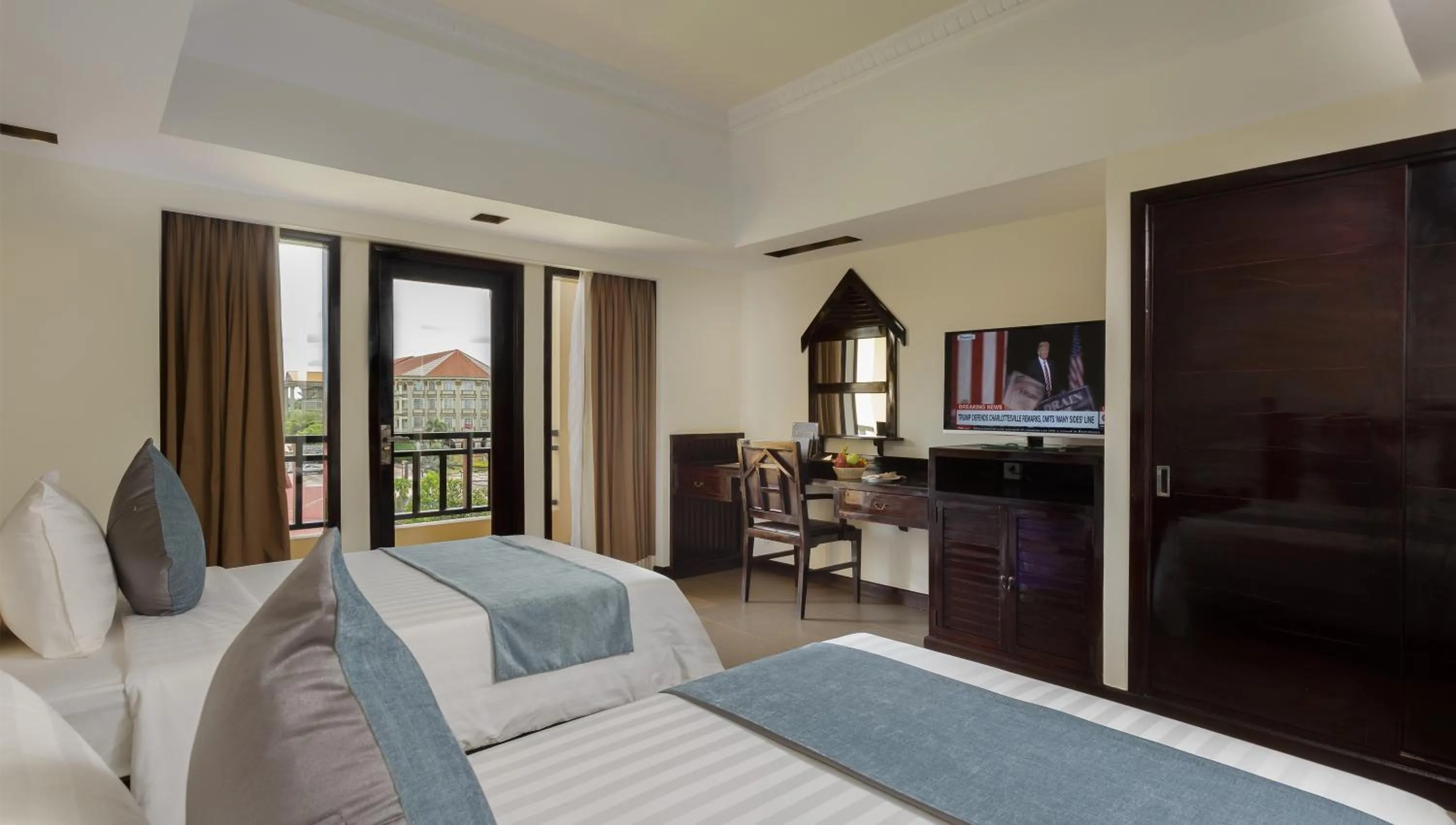 Communal lounge/ TV room, Bed in Sokchea Angkor Hotel