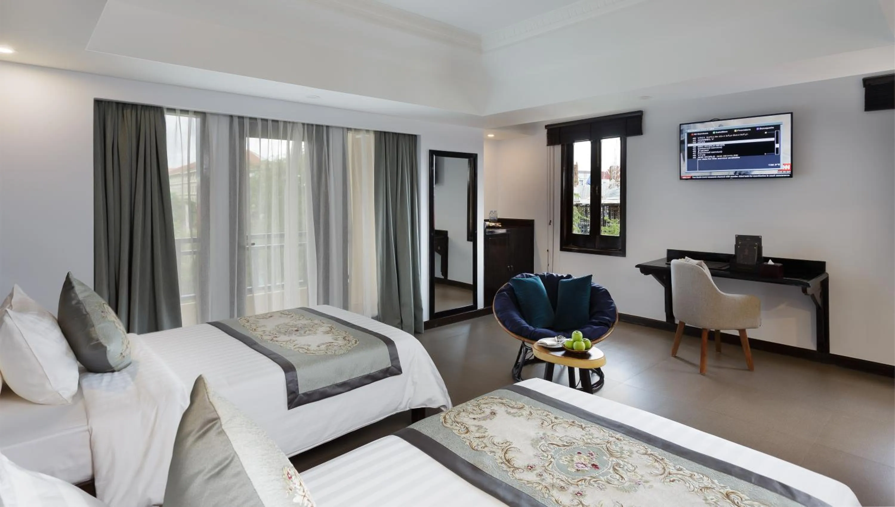 Living room, Bed in Sokchea Angkor Hotel