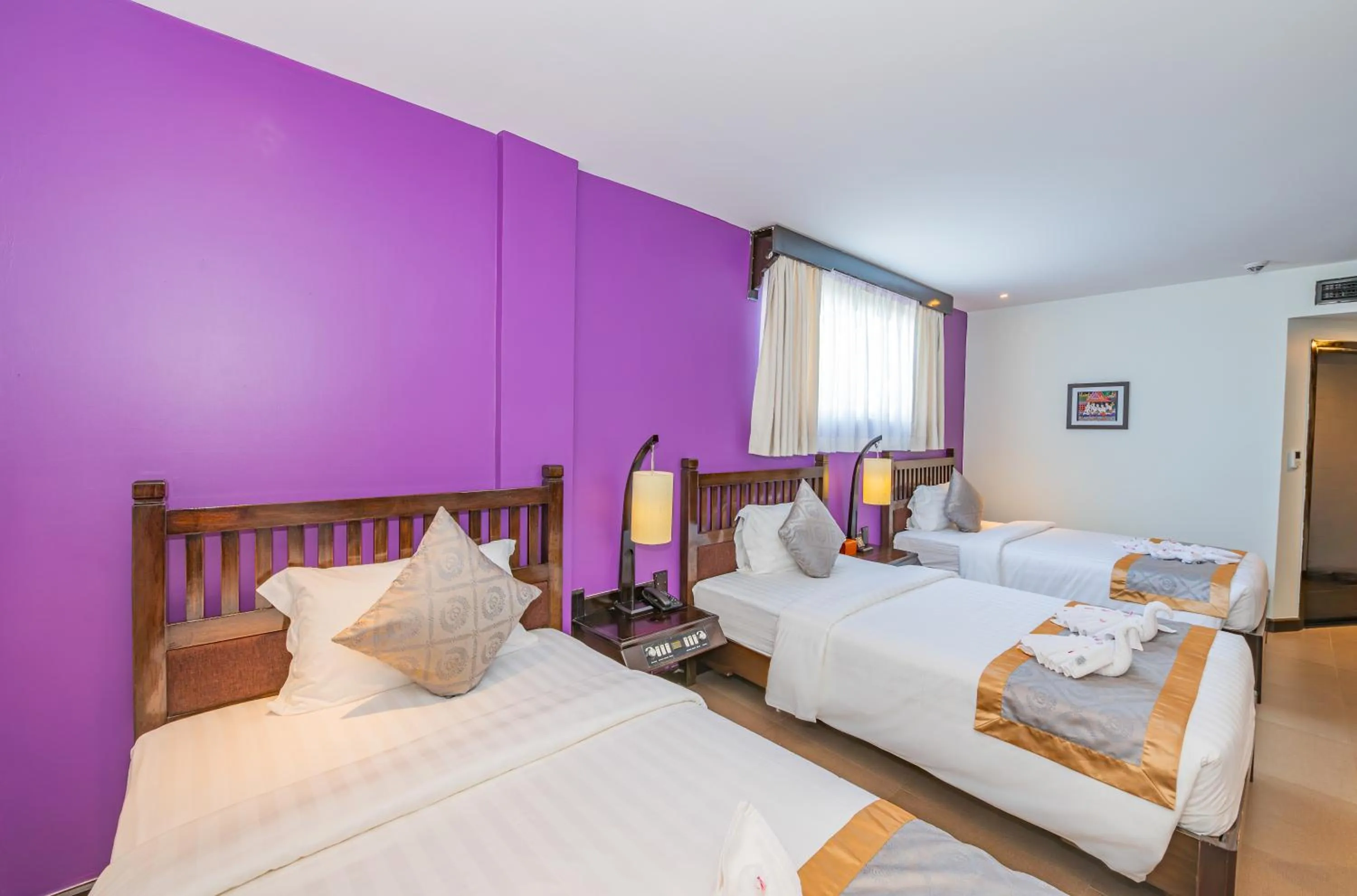 Photo of the whole room, Bed in Sokchea Angkor Hotel