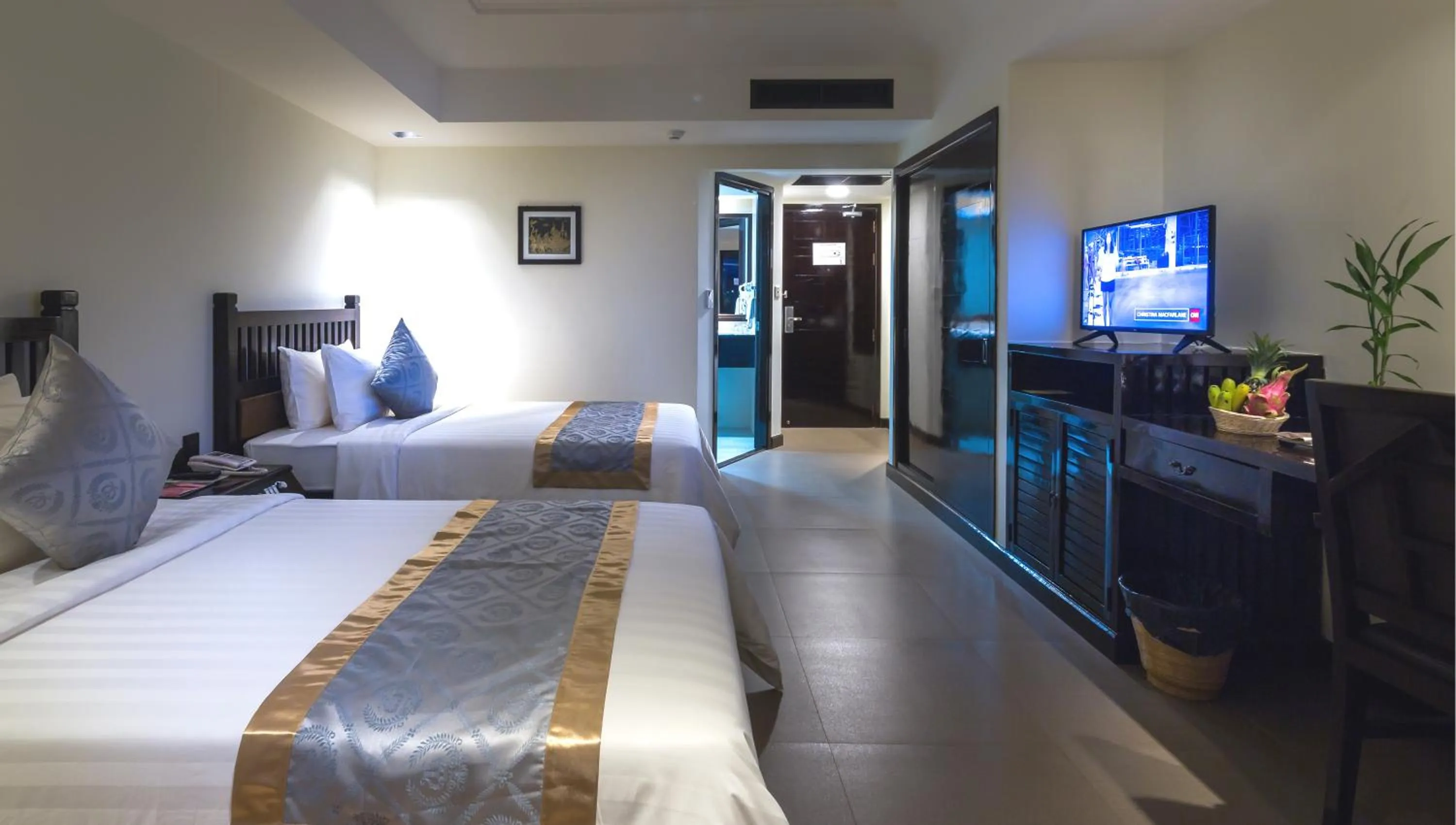 Photo of the whole room, Bed in Sokchea Angkor Hotel