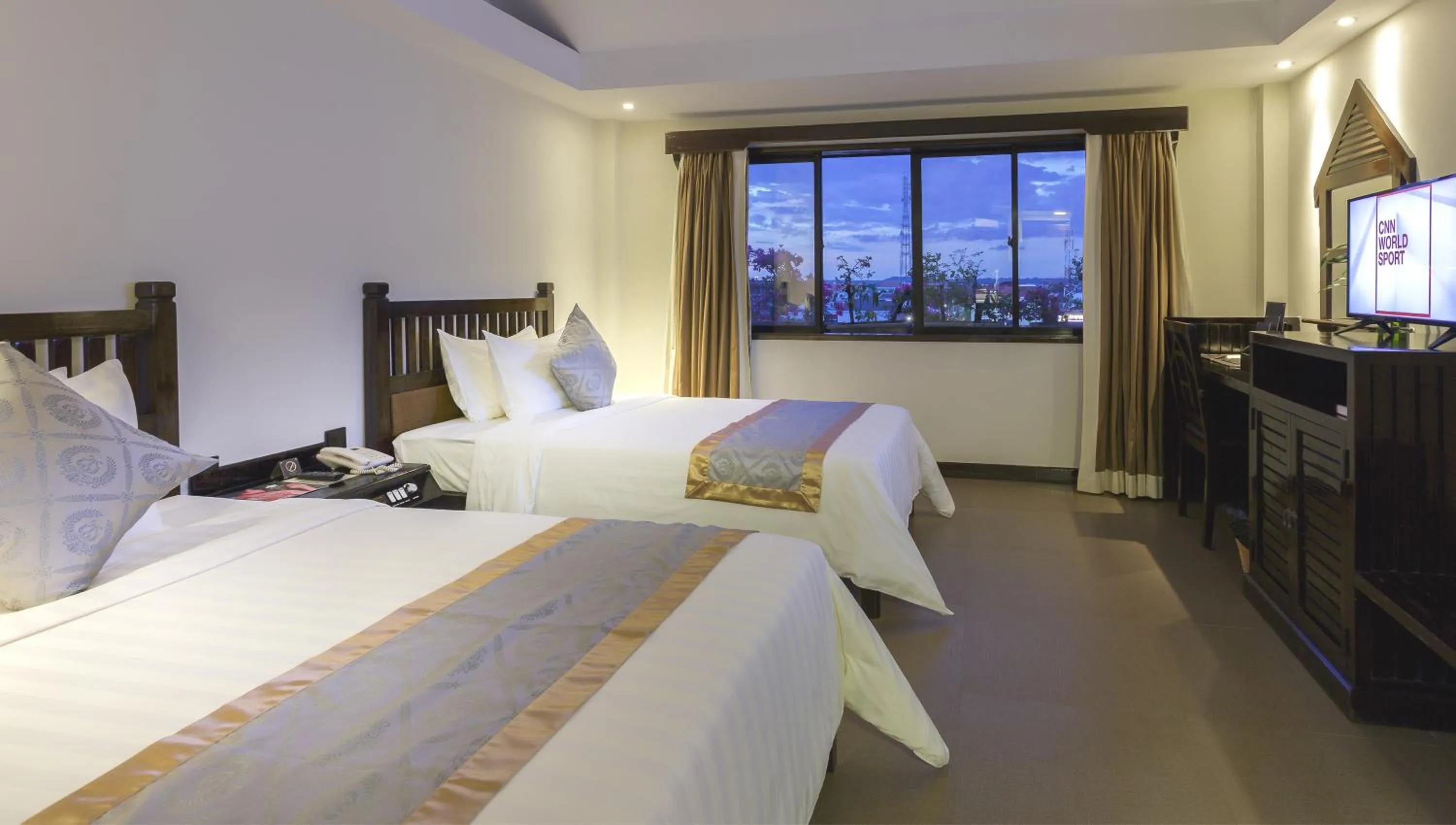 Photo of the whole room, Bed in Sokchea Angkor Hotel