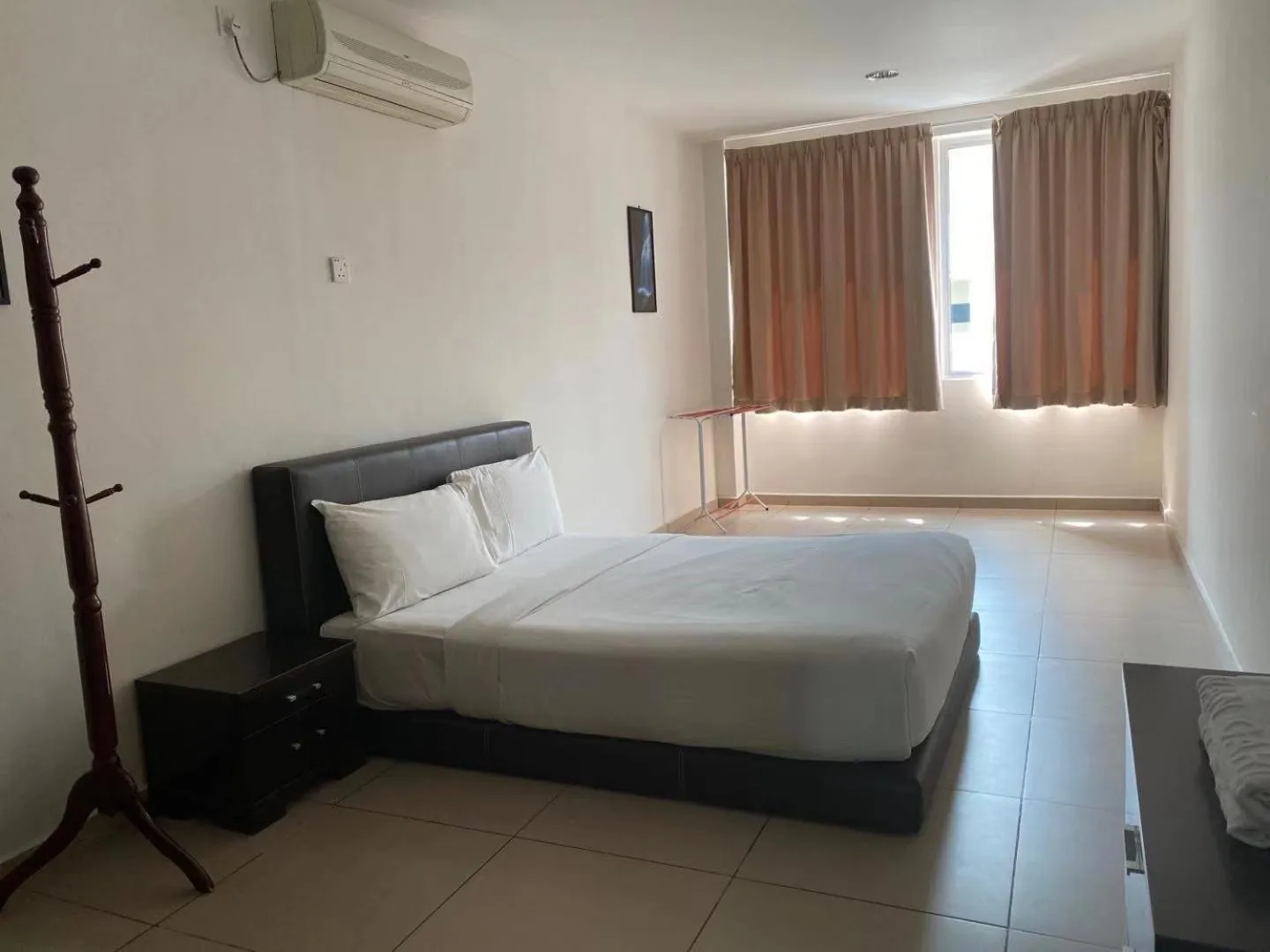 Bed in Swan Garden Hotel