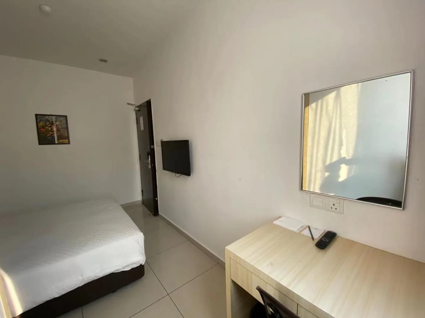 Bed in Swan Garden Hotel