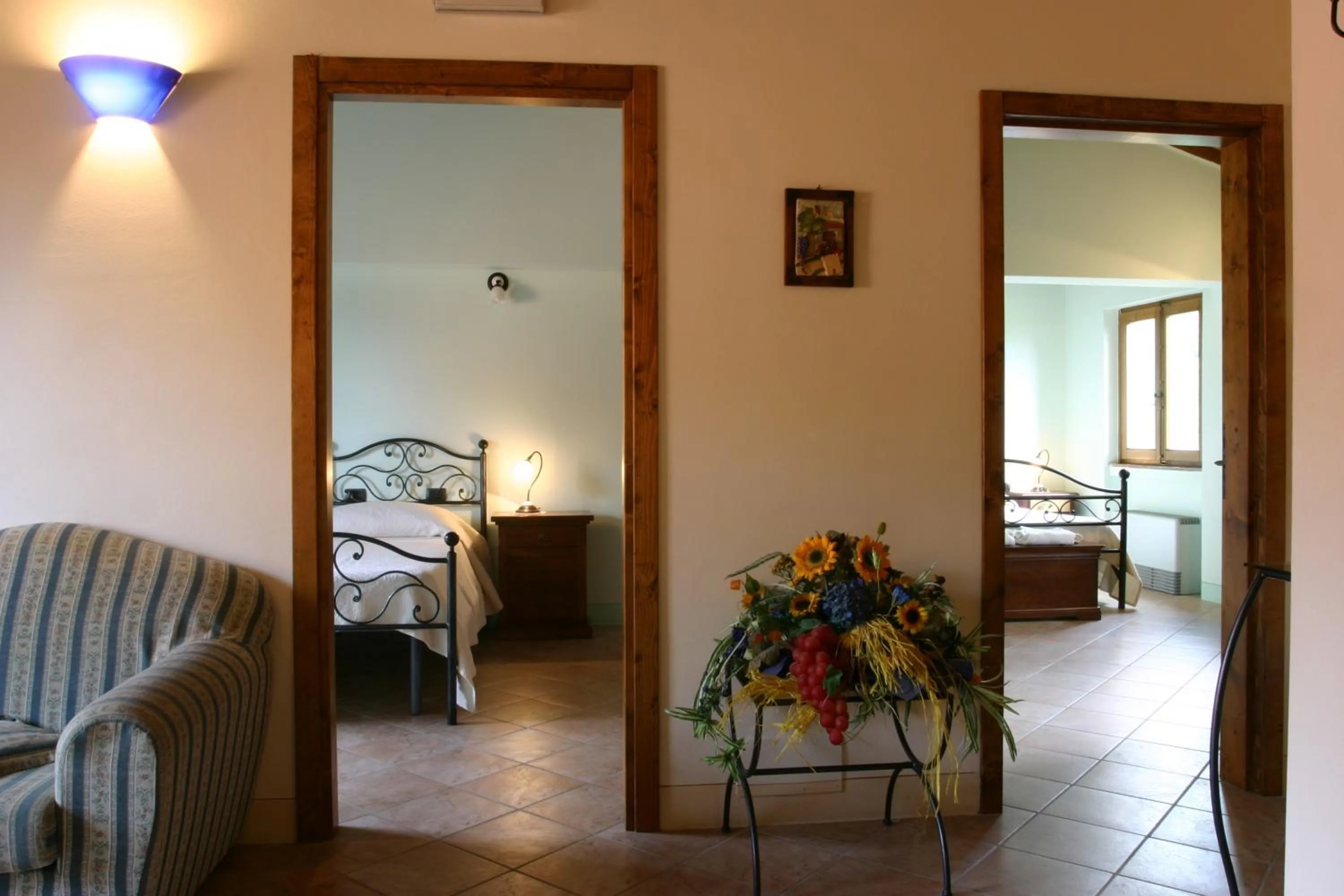 Living room, Bed in La Torre wine resort