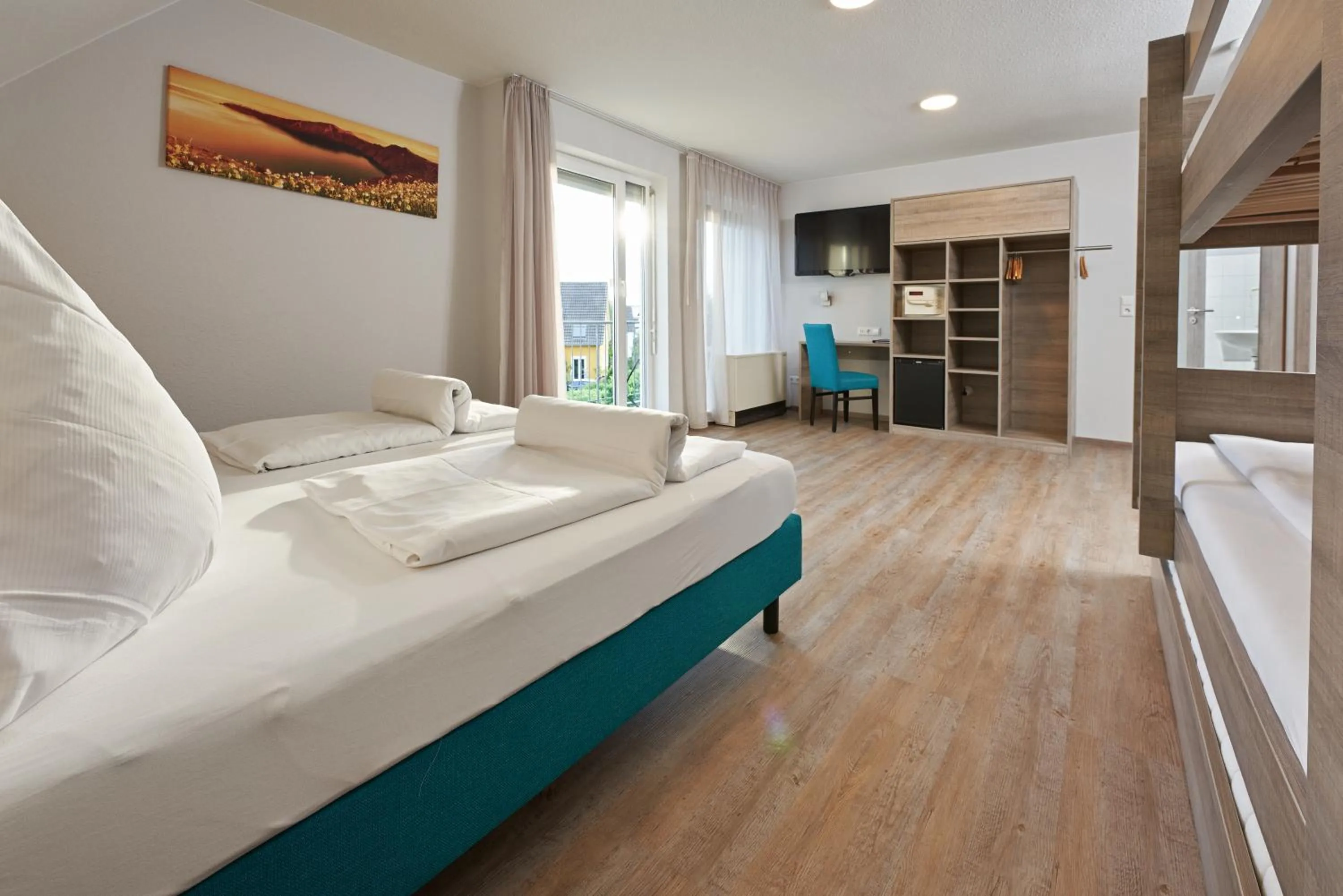 Photo of the whole room, Bed in Gästehaus Mythos