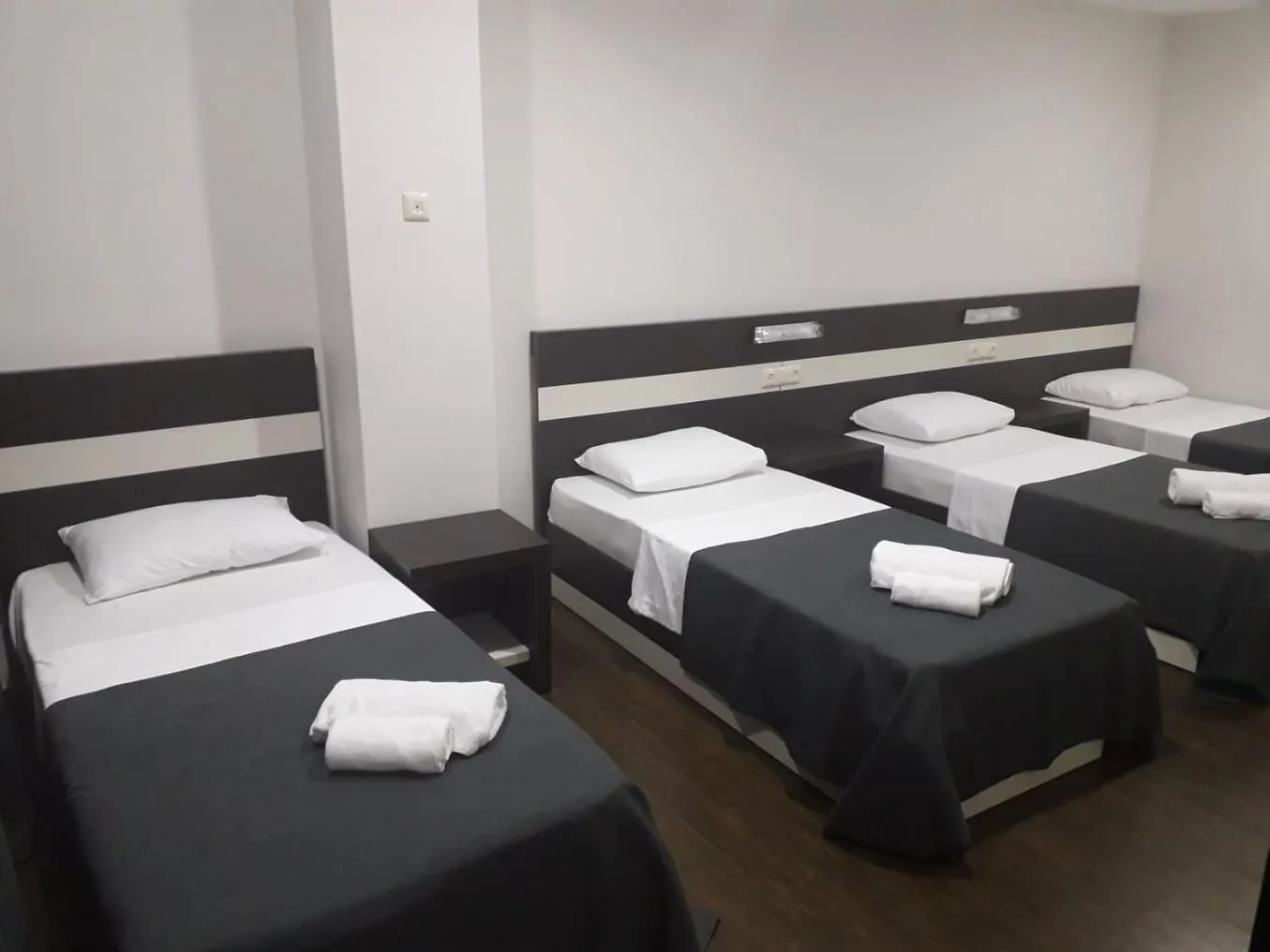 Bed in West Tower Hotel