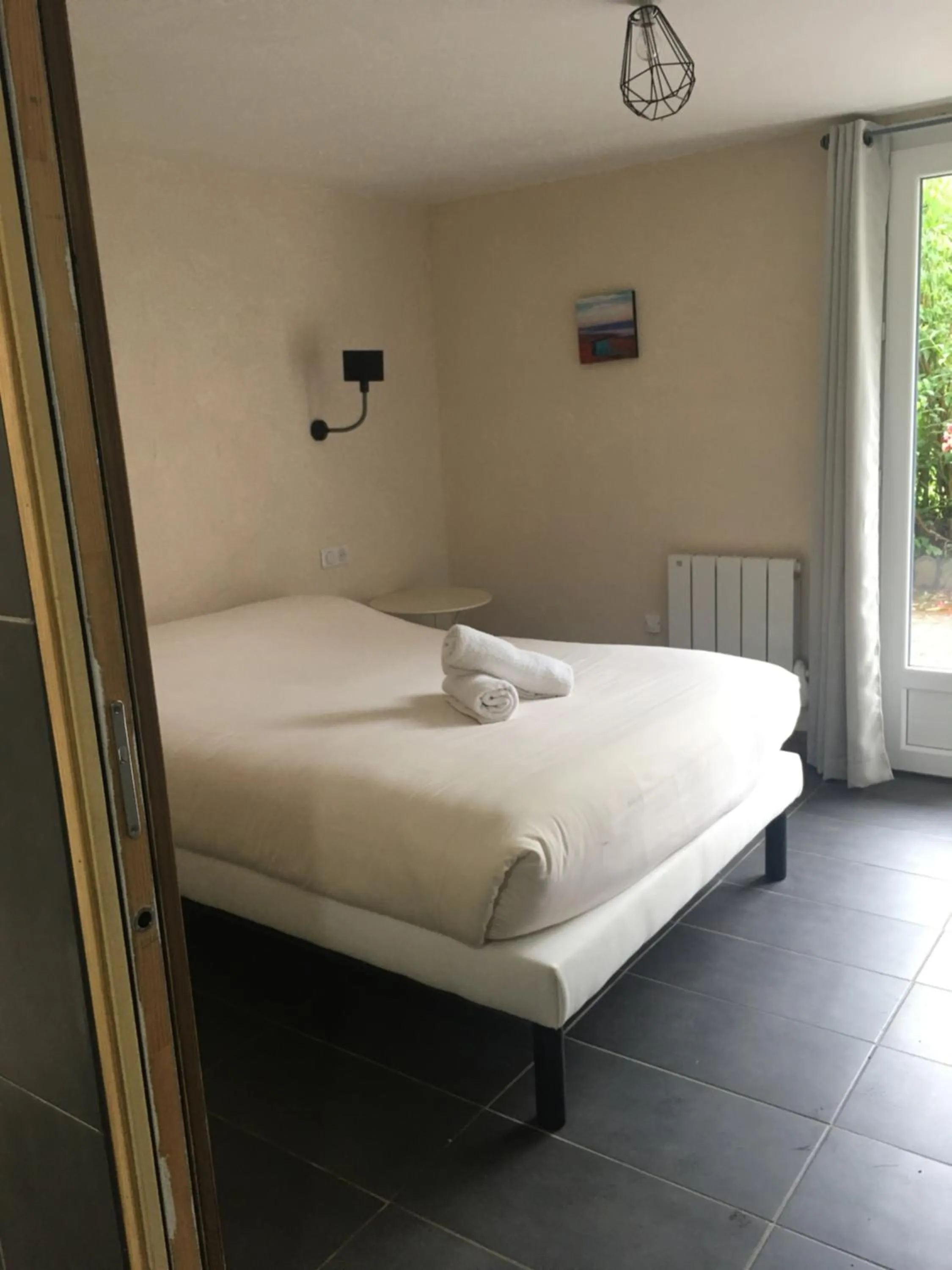 Photo of the whole room, Bed in Hotel Les Vieux Acacias