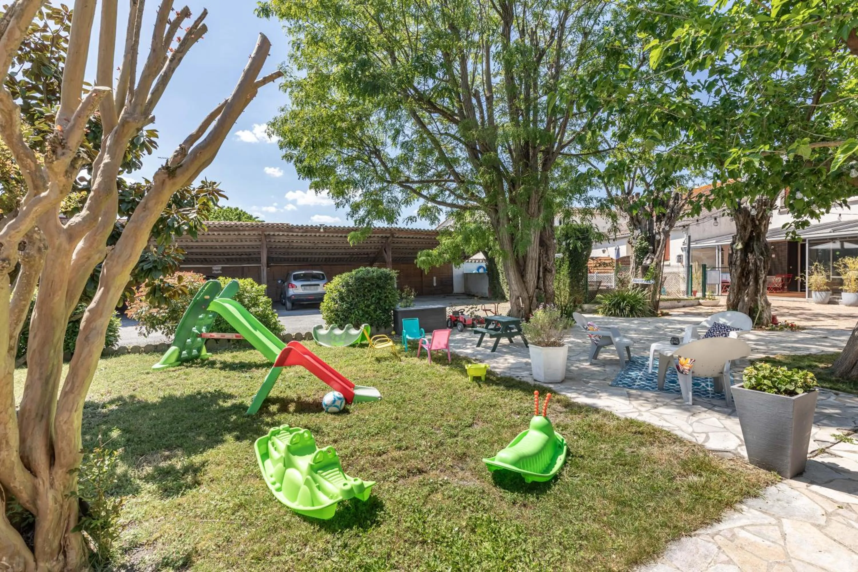 Children play ground in Hotel Les Vieux Acacias