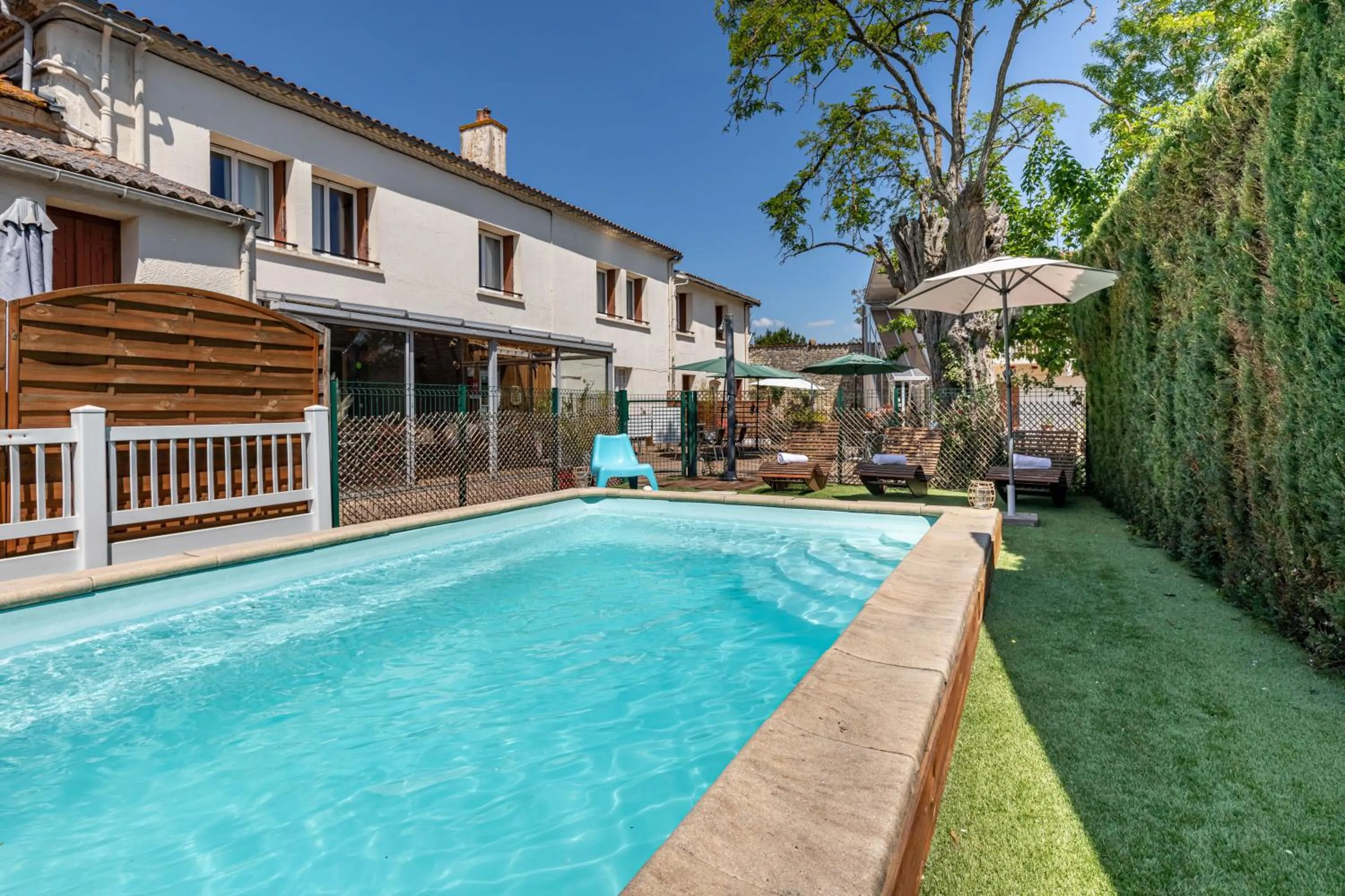 Swimming pool in Hotel Les Vieux Acacias