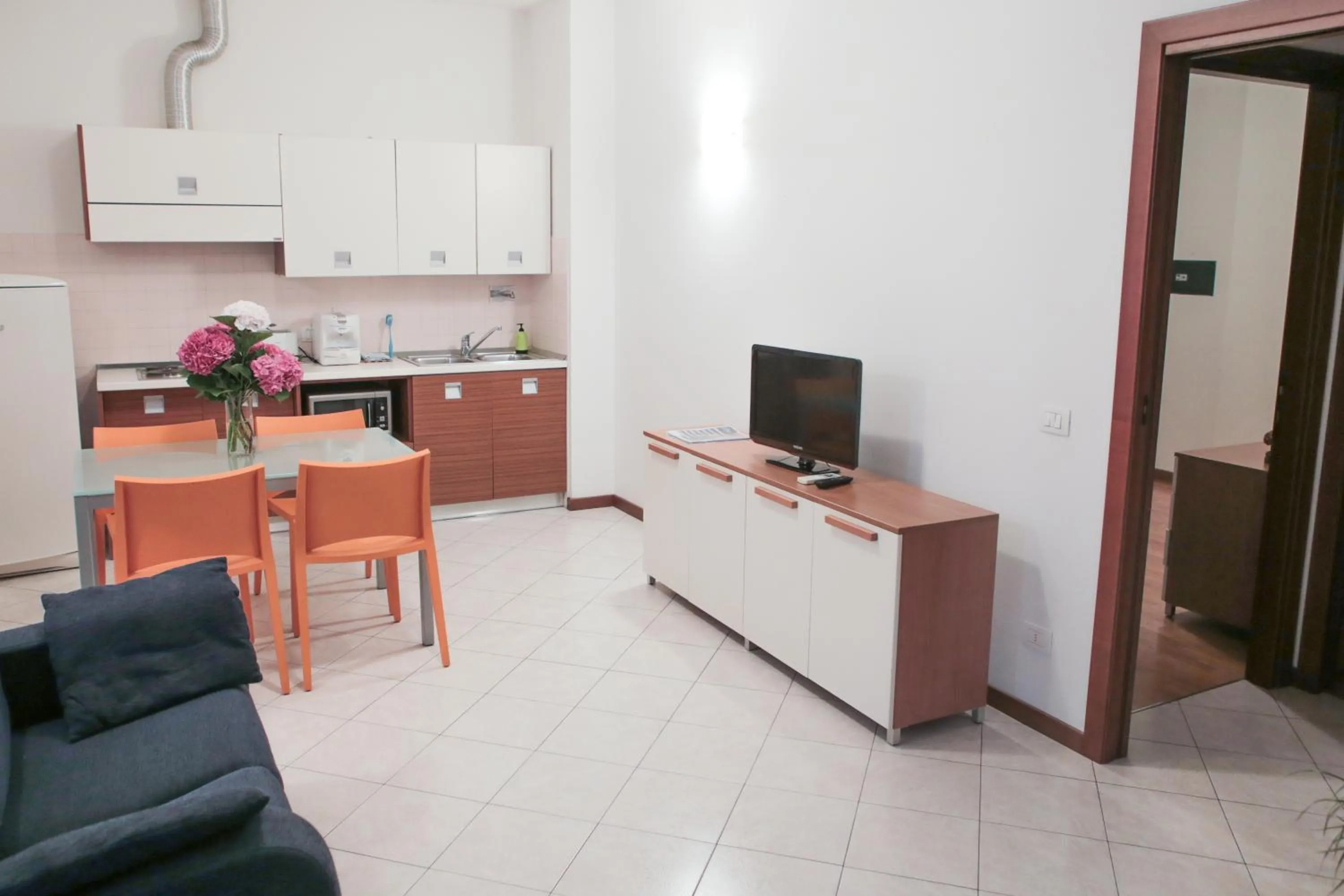 Kitchen or kitchenette in Verona Class ApartHotel "Residenze del Cuore"