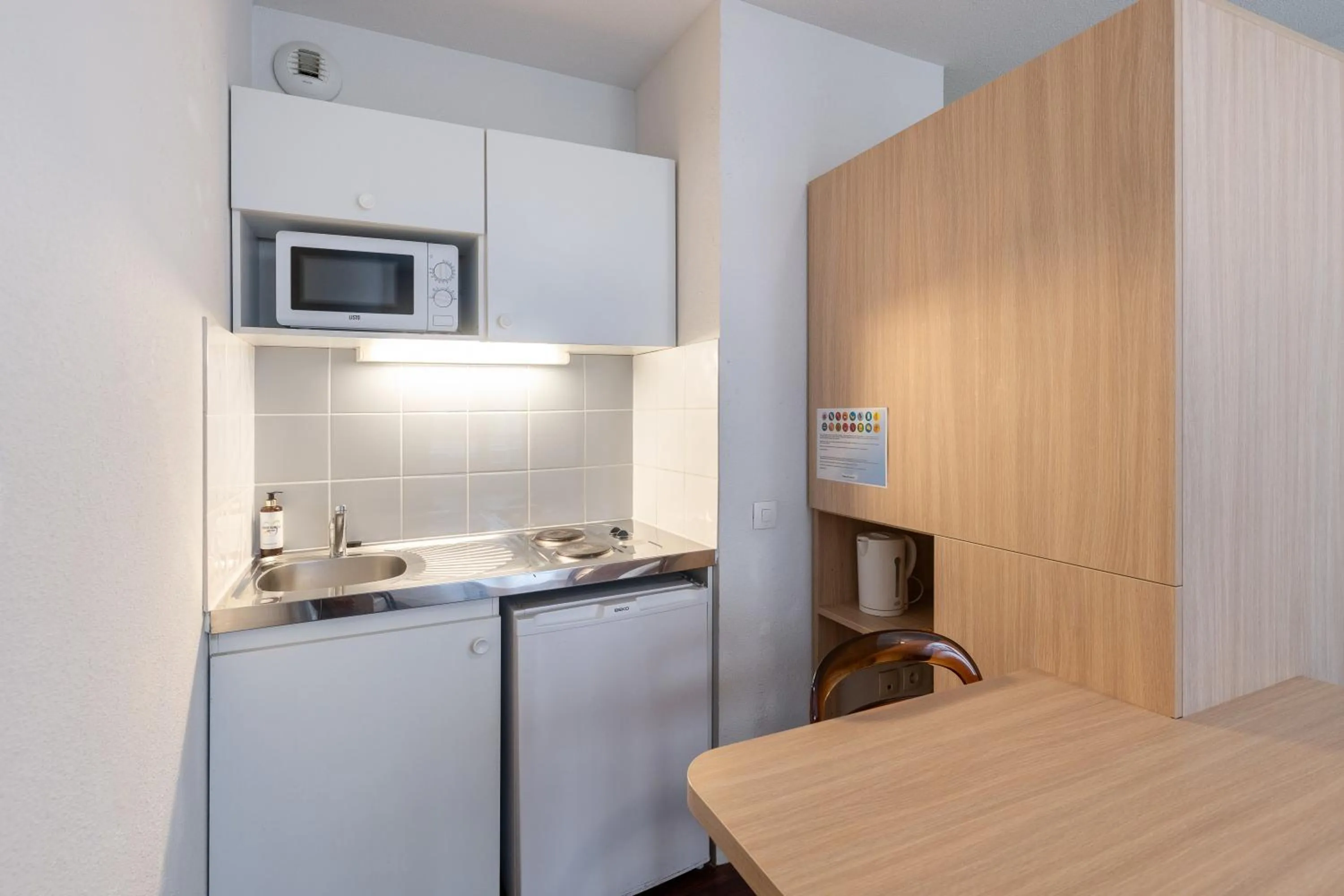 Kitchen or kitchenette in Residhotel St Etienne Centre