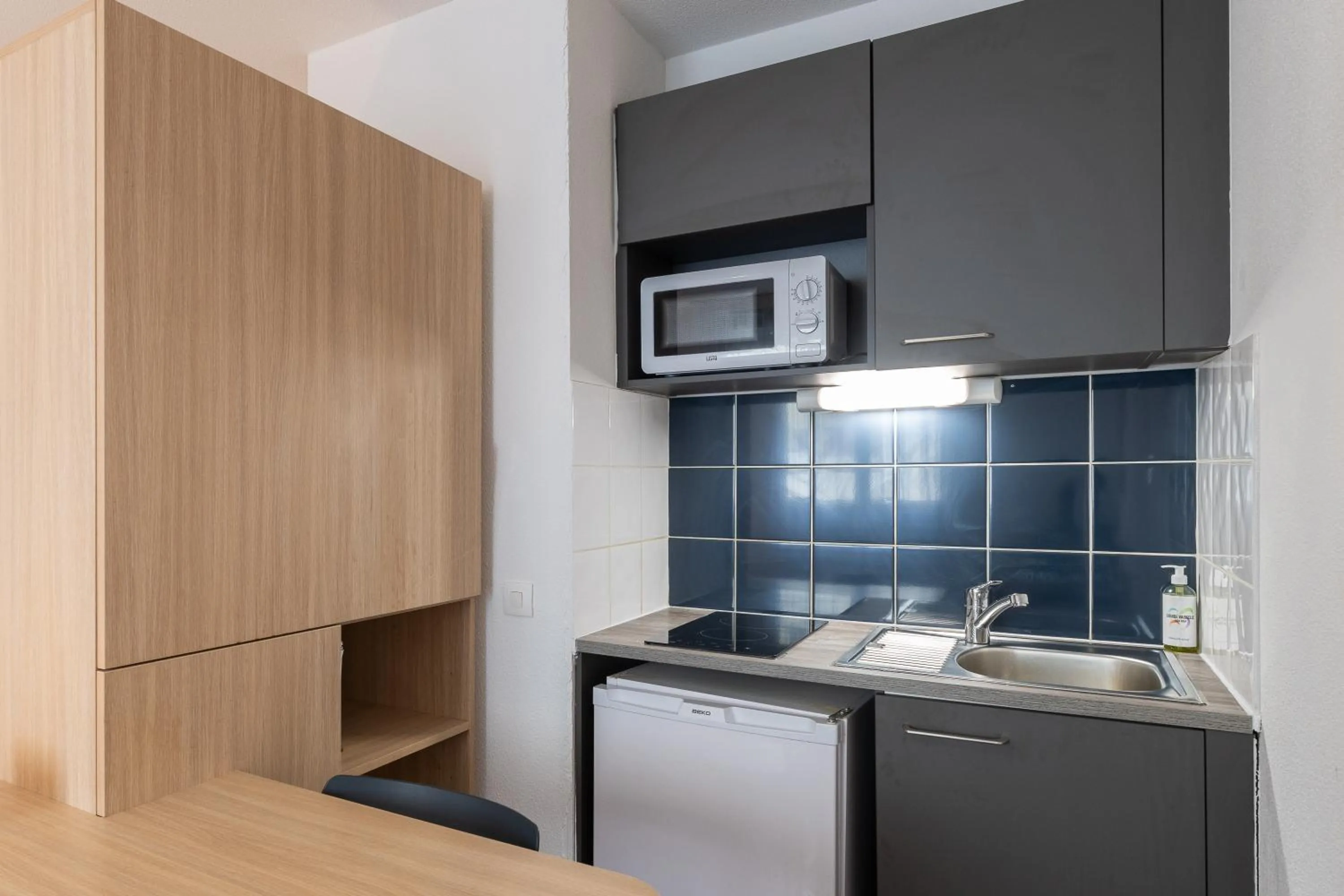 Kitchen or kitchenette in Residhotel St Etienne Centre