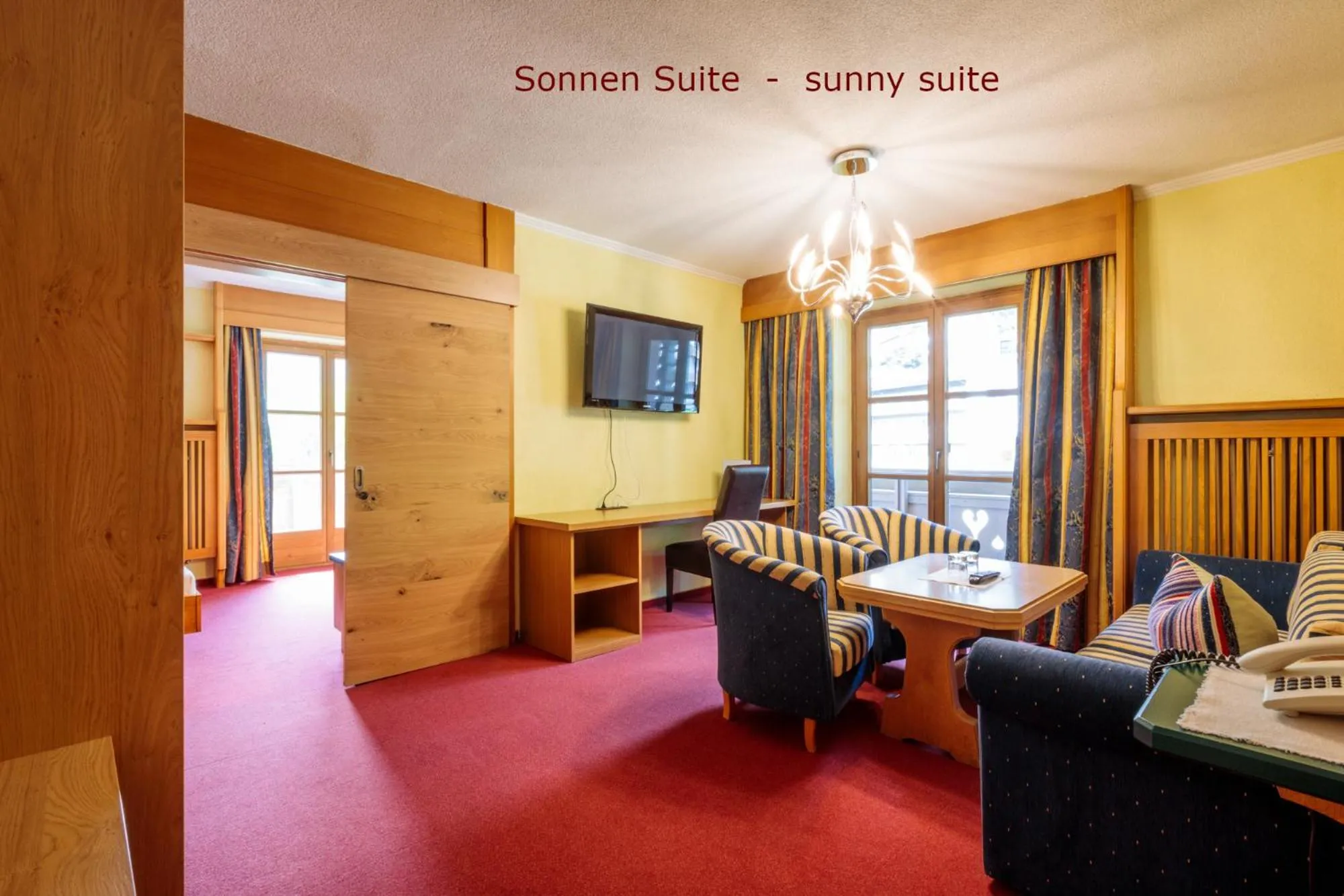 Living room, Bed in Parkhotel Sölden