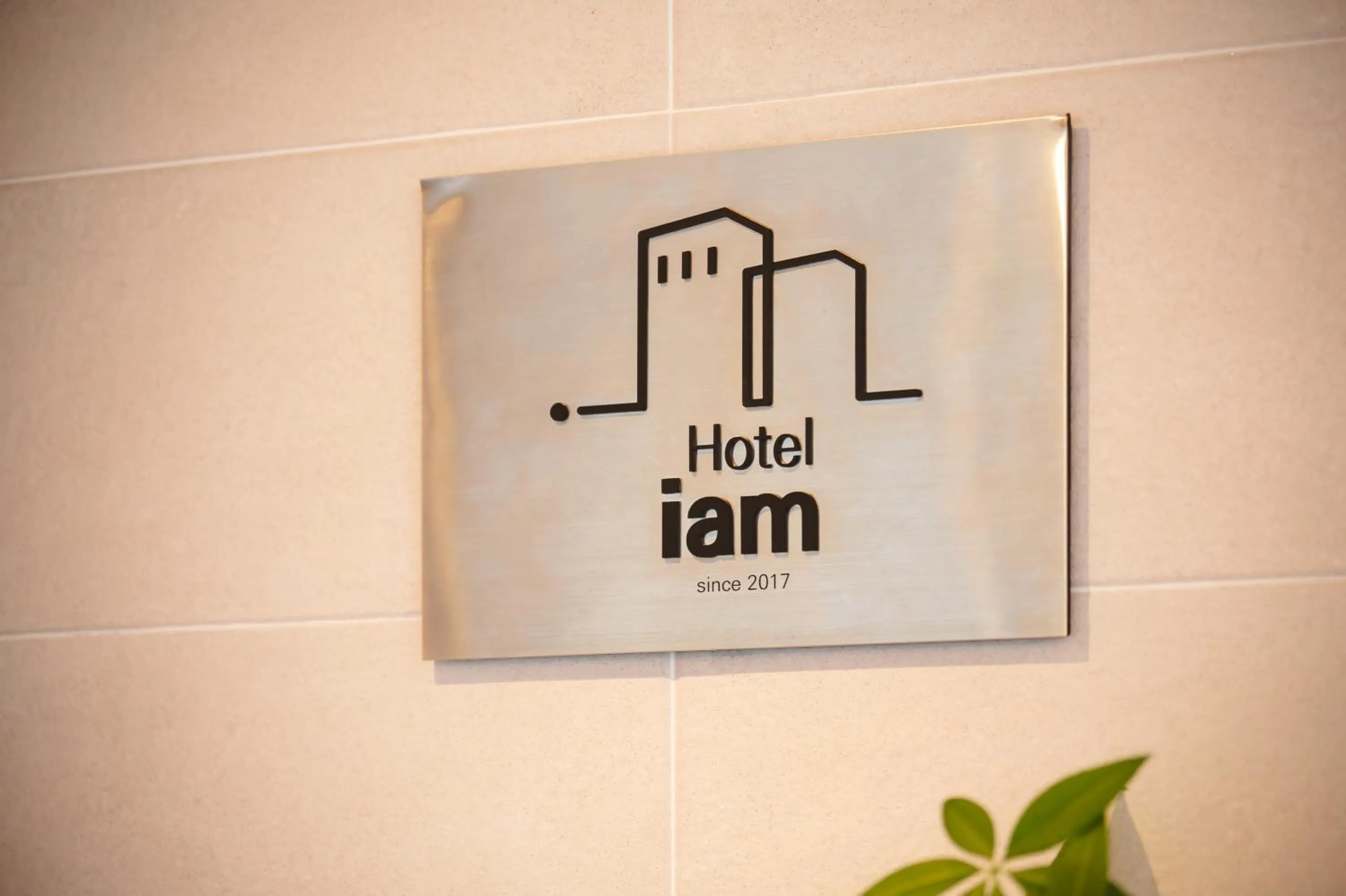 Property logo or sign in Hotel Iam