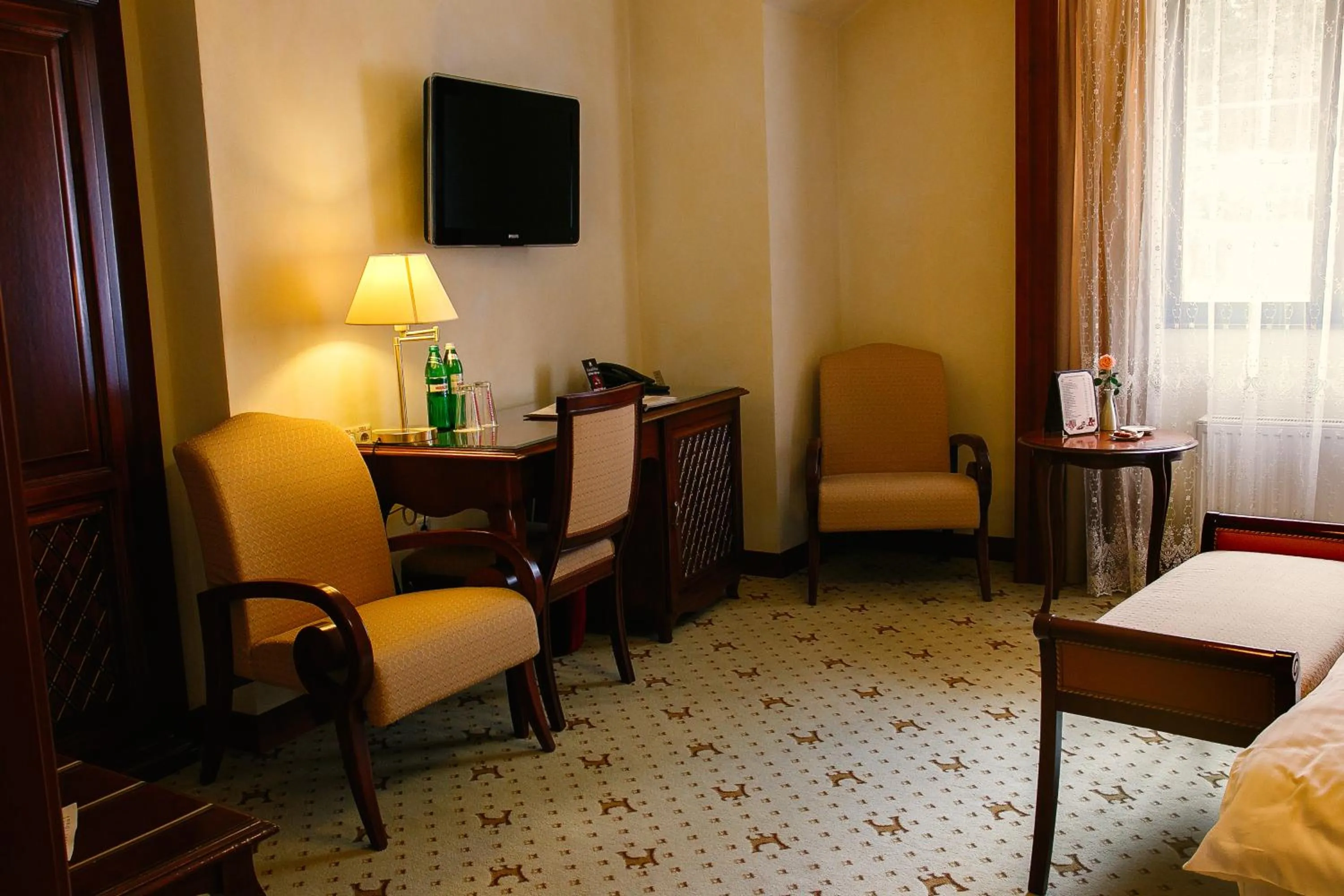 Seating area, Bed in Citadel Inn Gastro Boutique Hotel - Готель Цитадель Львів