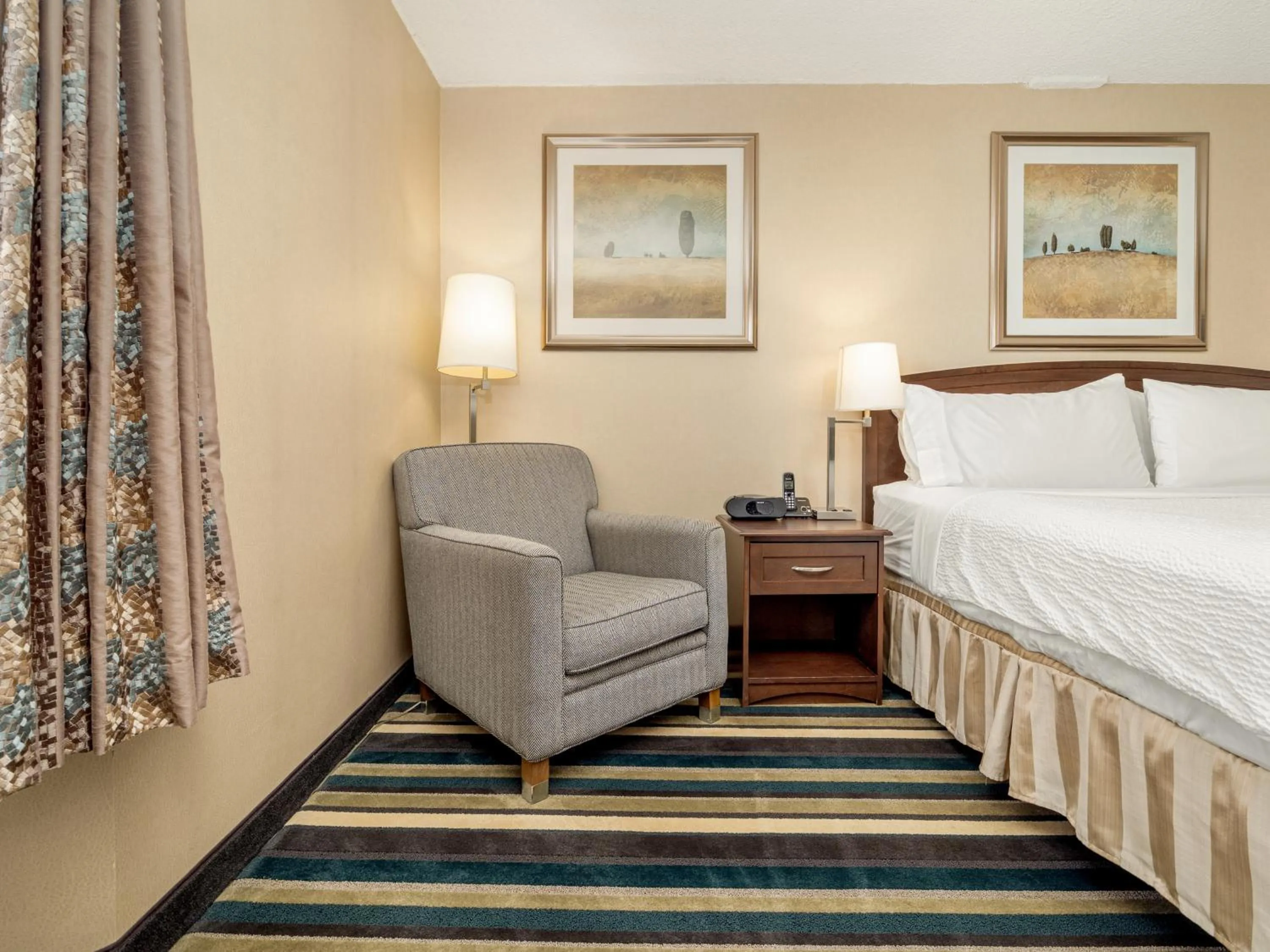 Seating area, Bed in Holiday Inn Conference Centre Edmonton South by IHG