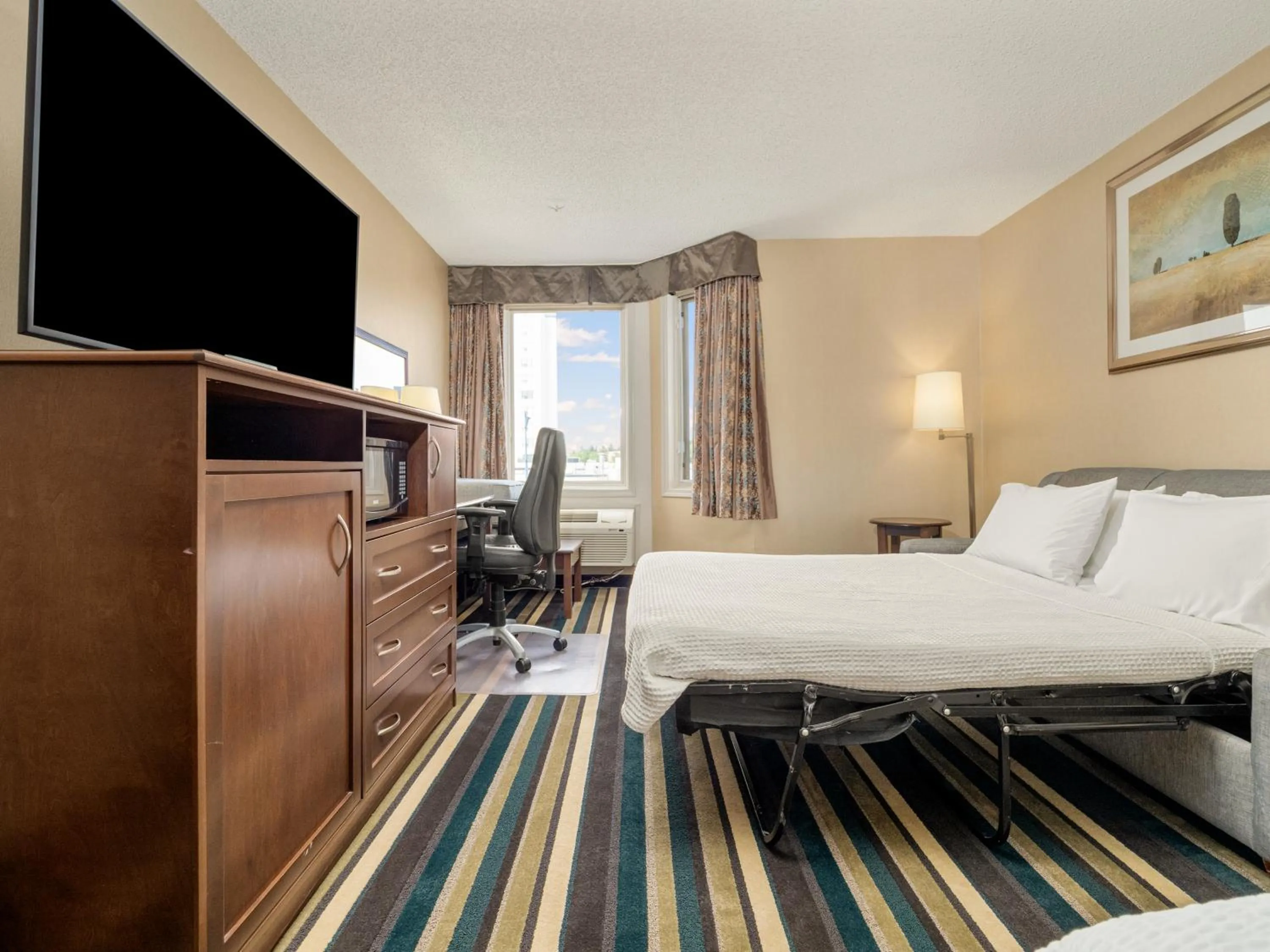 Bedroom, Bed in Holiday Inn Conference Centre Edmonton South by IHG