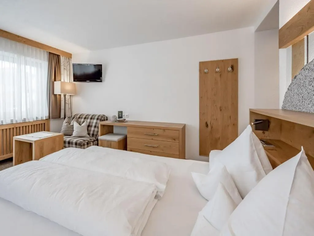 Bed in Hotel Sportpension Carinthia