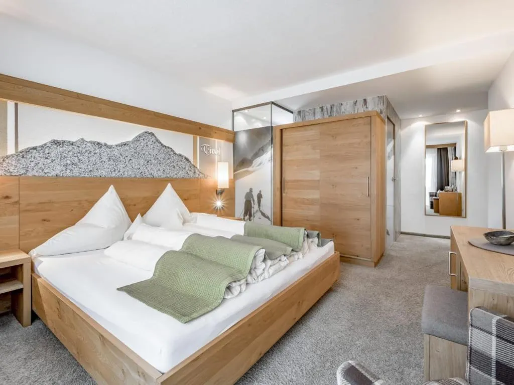 Bed in Hotel Sportpension Carinthia
