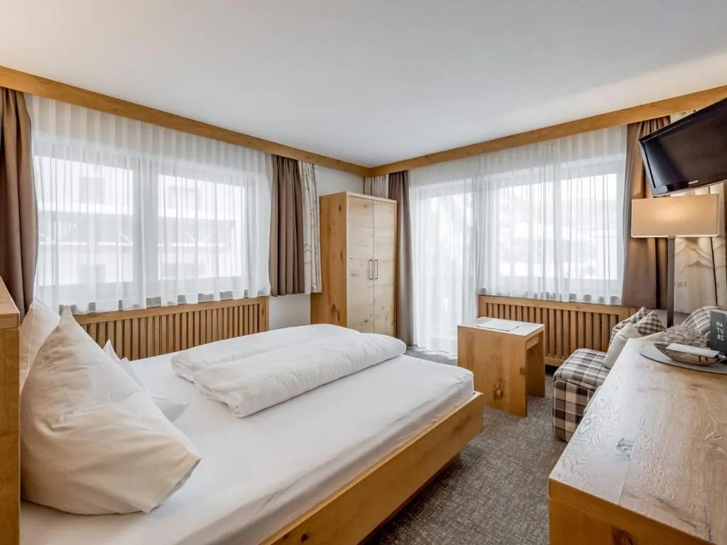 Bed in Hotel Sportpension Carinthia
