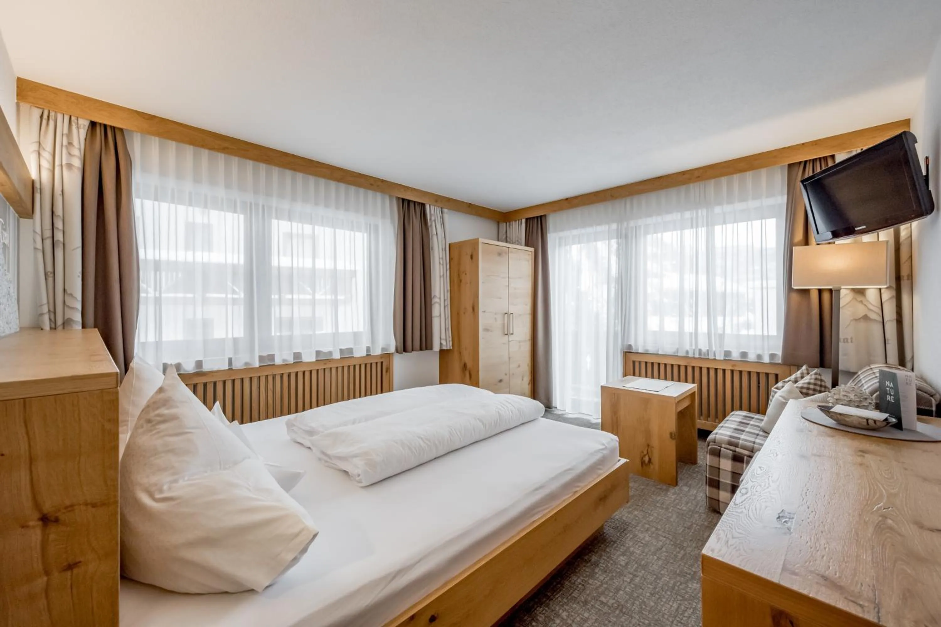 Photo of the whole room, Bed in Hotel Sportpension Carinthia