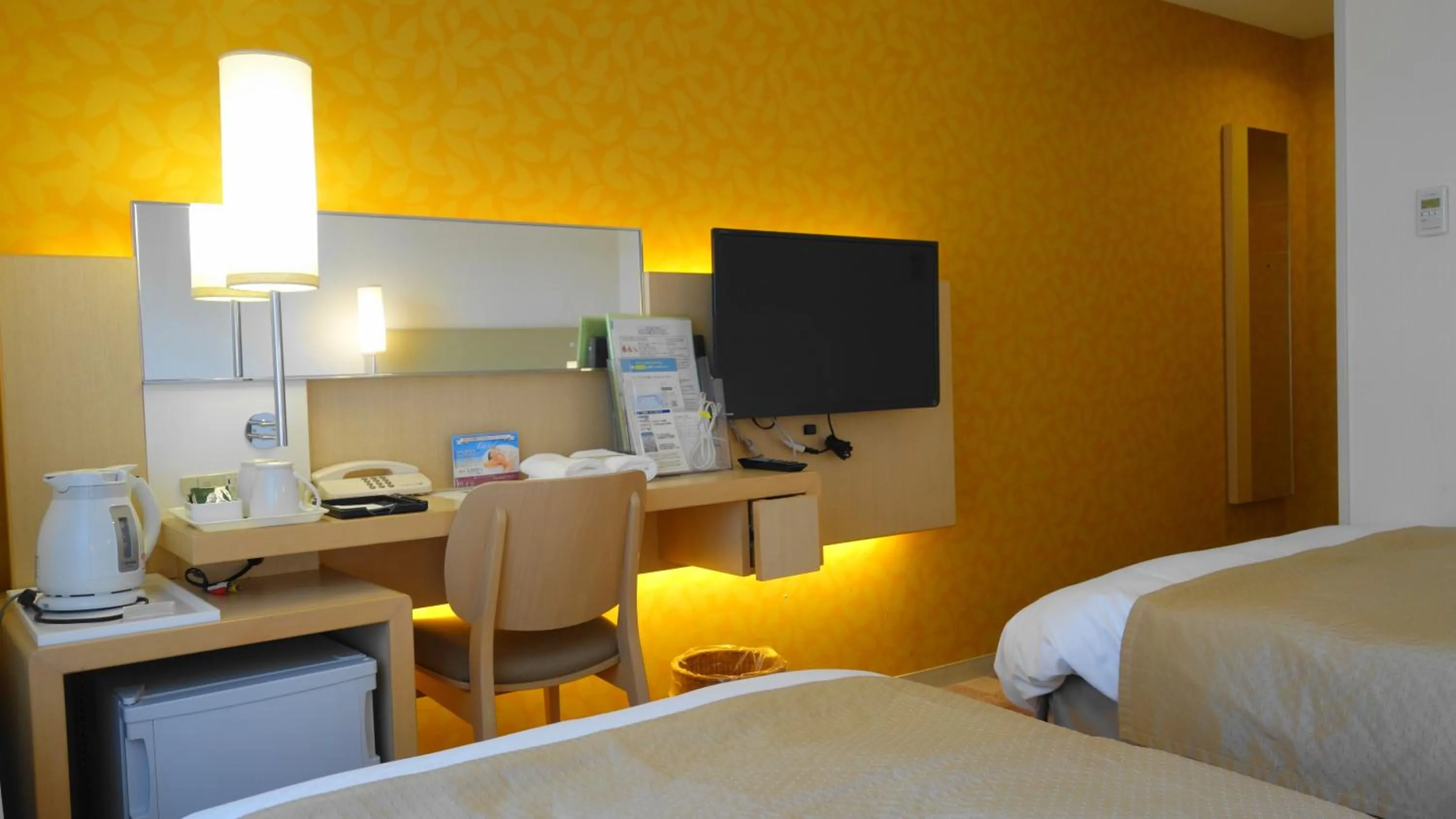 Communal lounge/ TV room, Bed in City Plaza Osaka