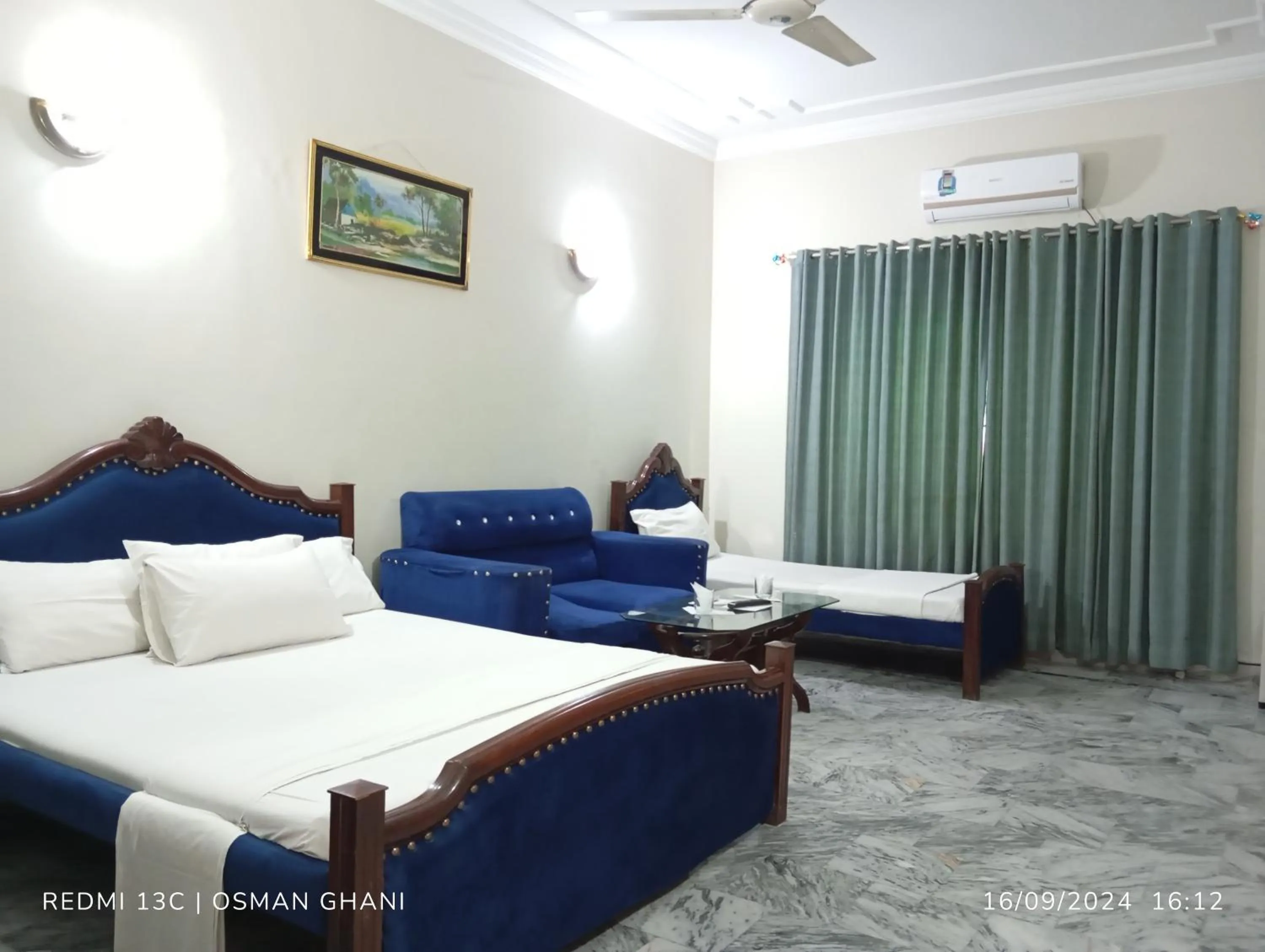 Bed in Orion International Guest House