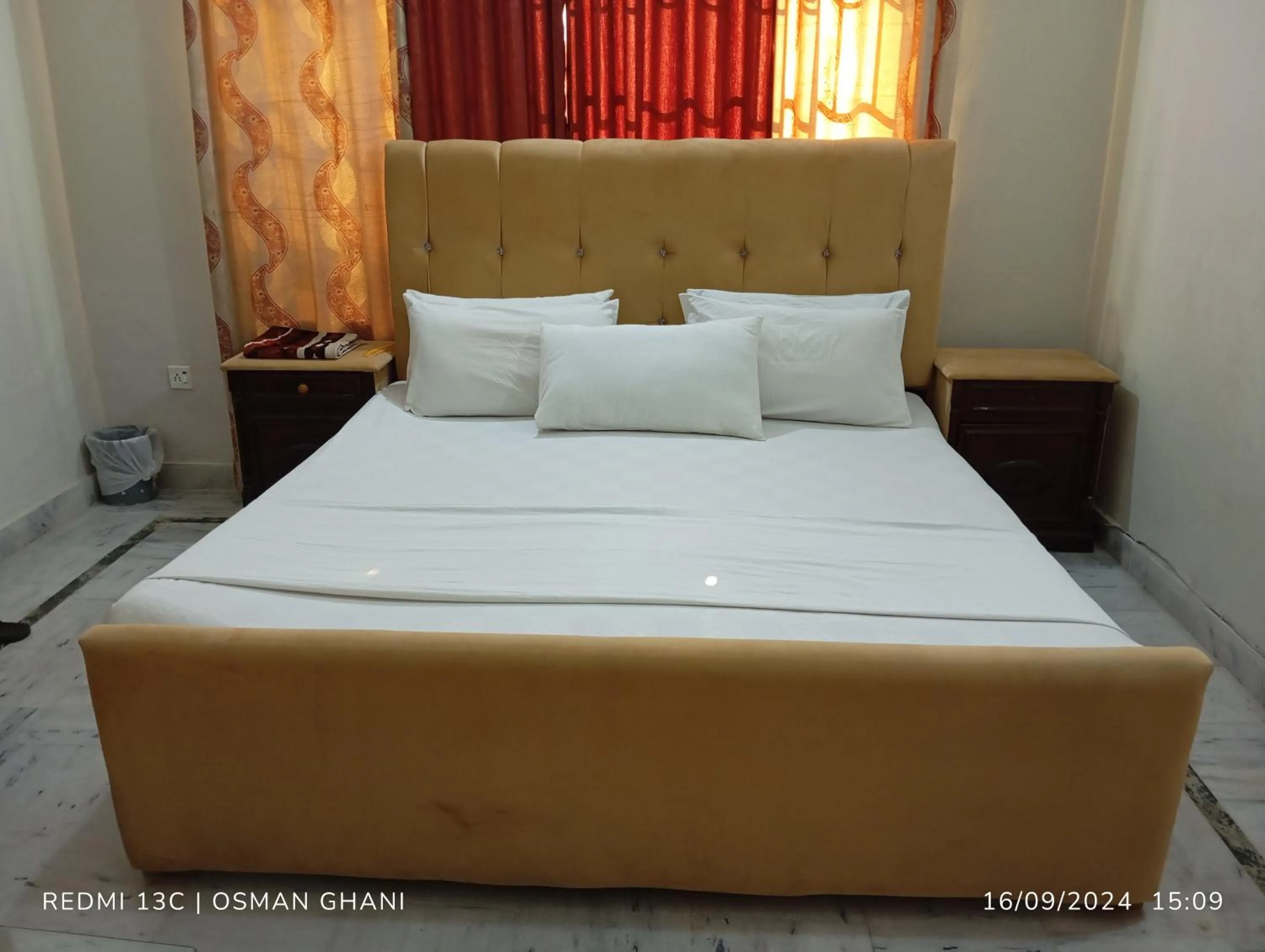 Bed in Orion International Guest House