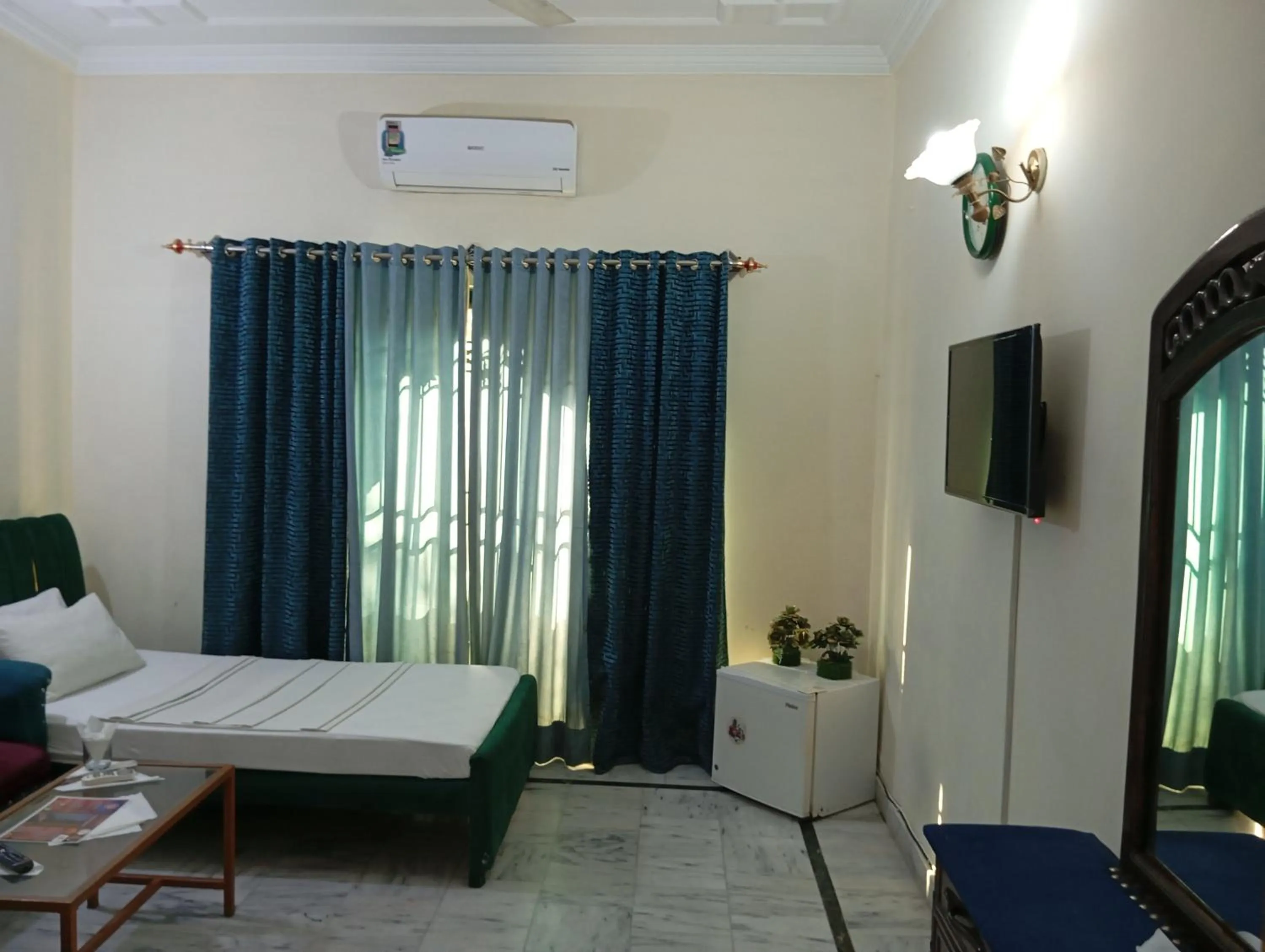 Bed in Orion International Guest House