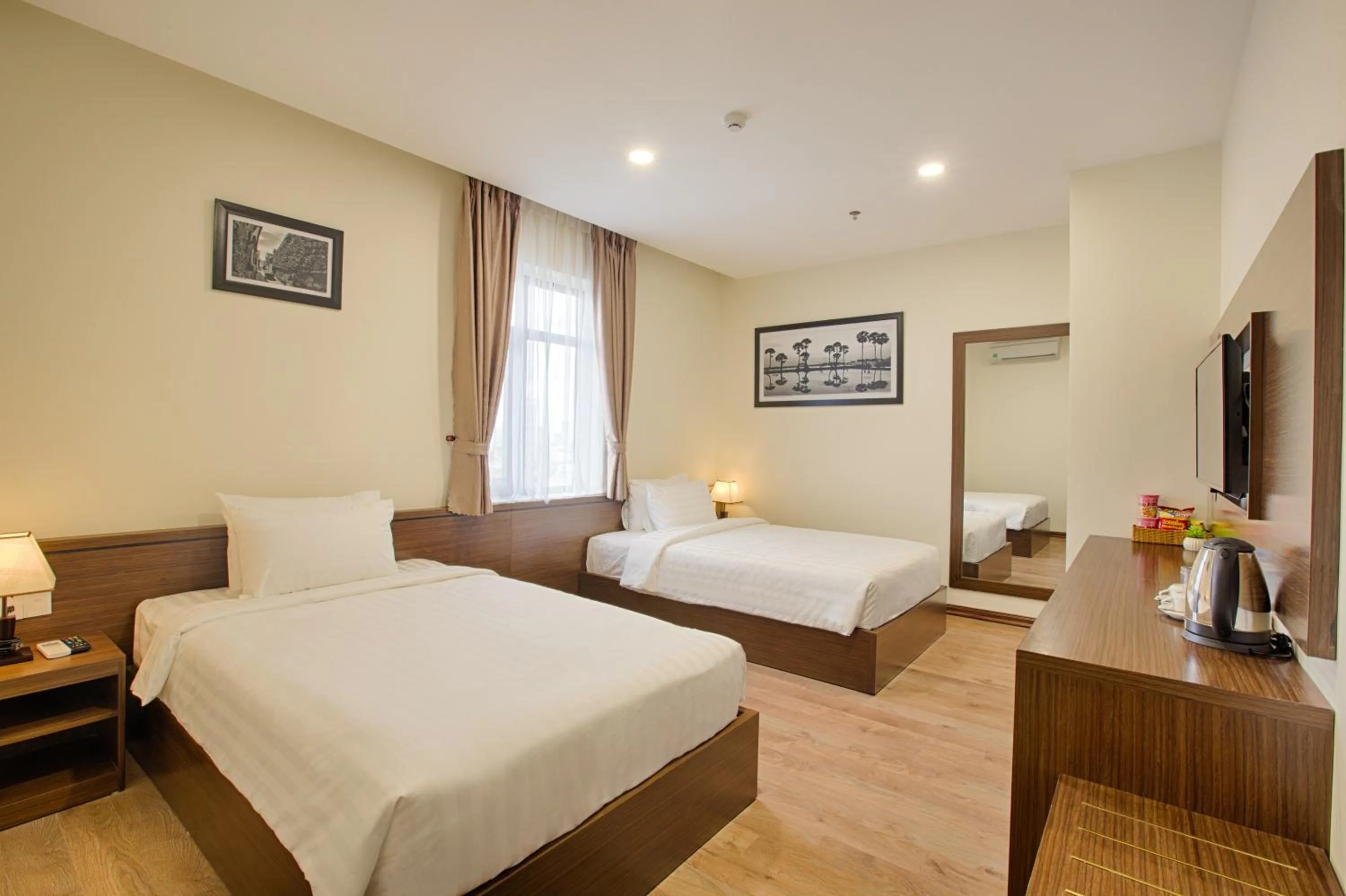 Photo of the whole room, Bed in Central Hotel & Spa Danang