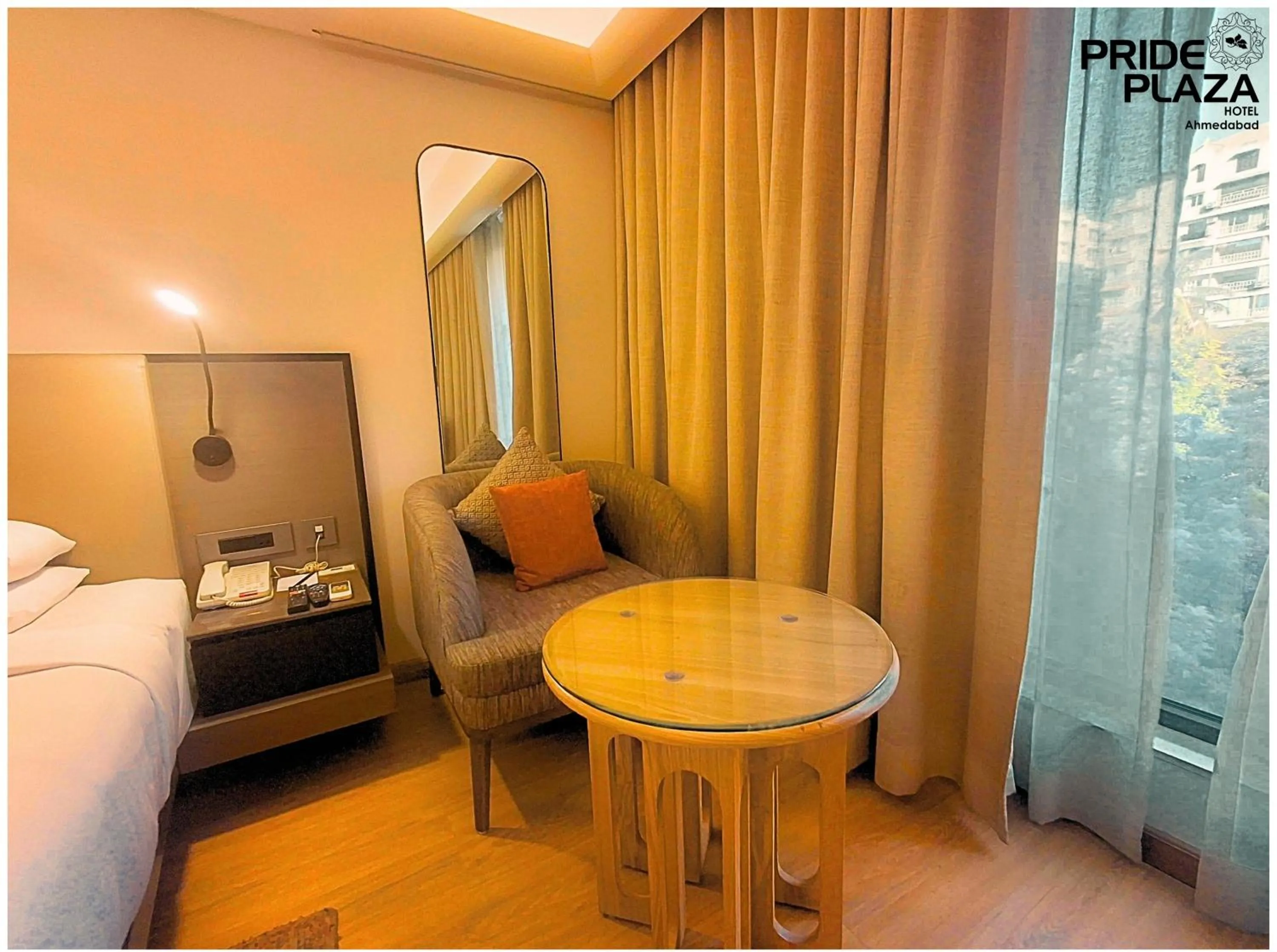 Bed in Pride Plaza Hotel, Ahmedabad