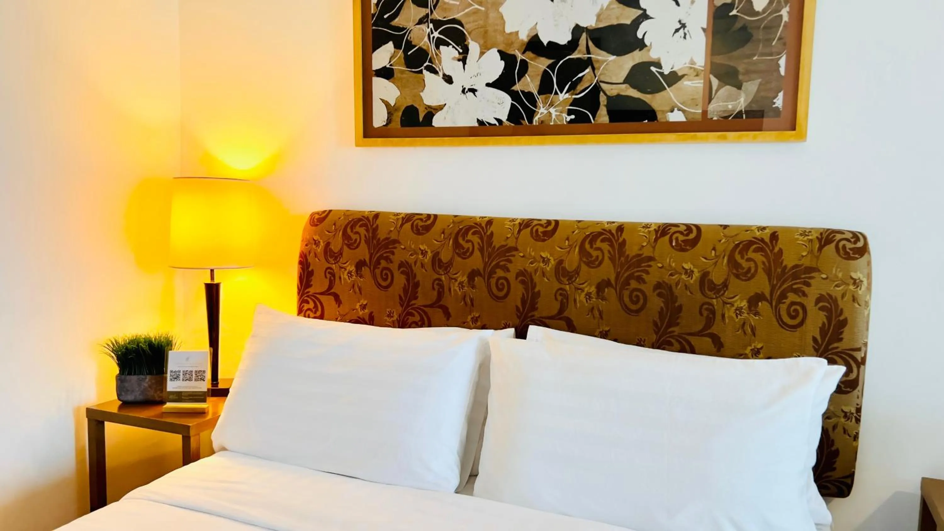 Bed in One Tagaytay Place Hotel Suites OFFICIAL ACCOUNT