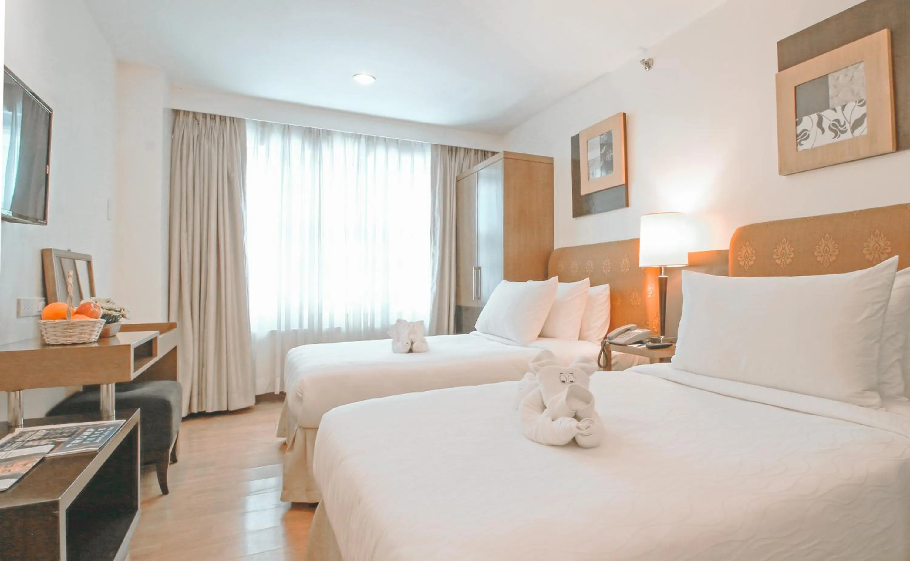 Bed in One Tagaytay Place Hotel Suites OFFICIAL ACCOUNT