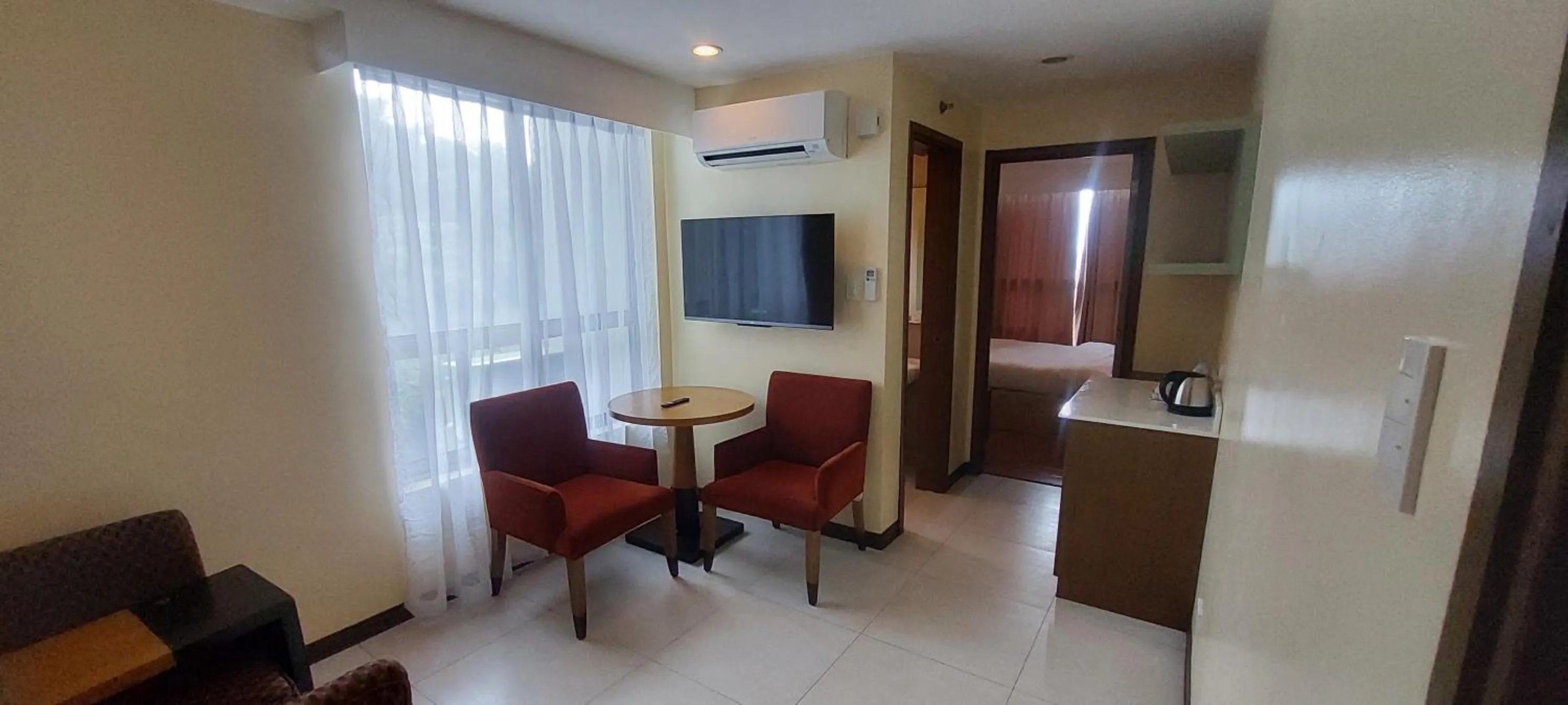 Living room in One Tagaytay Place Hotel Suites OFFICIAL ACCOUNT