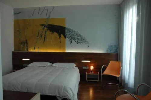 Photo of the whole room, Bed in Alloggi Taverna Caorlina