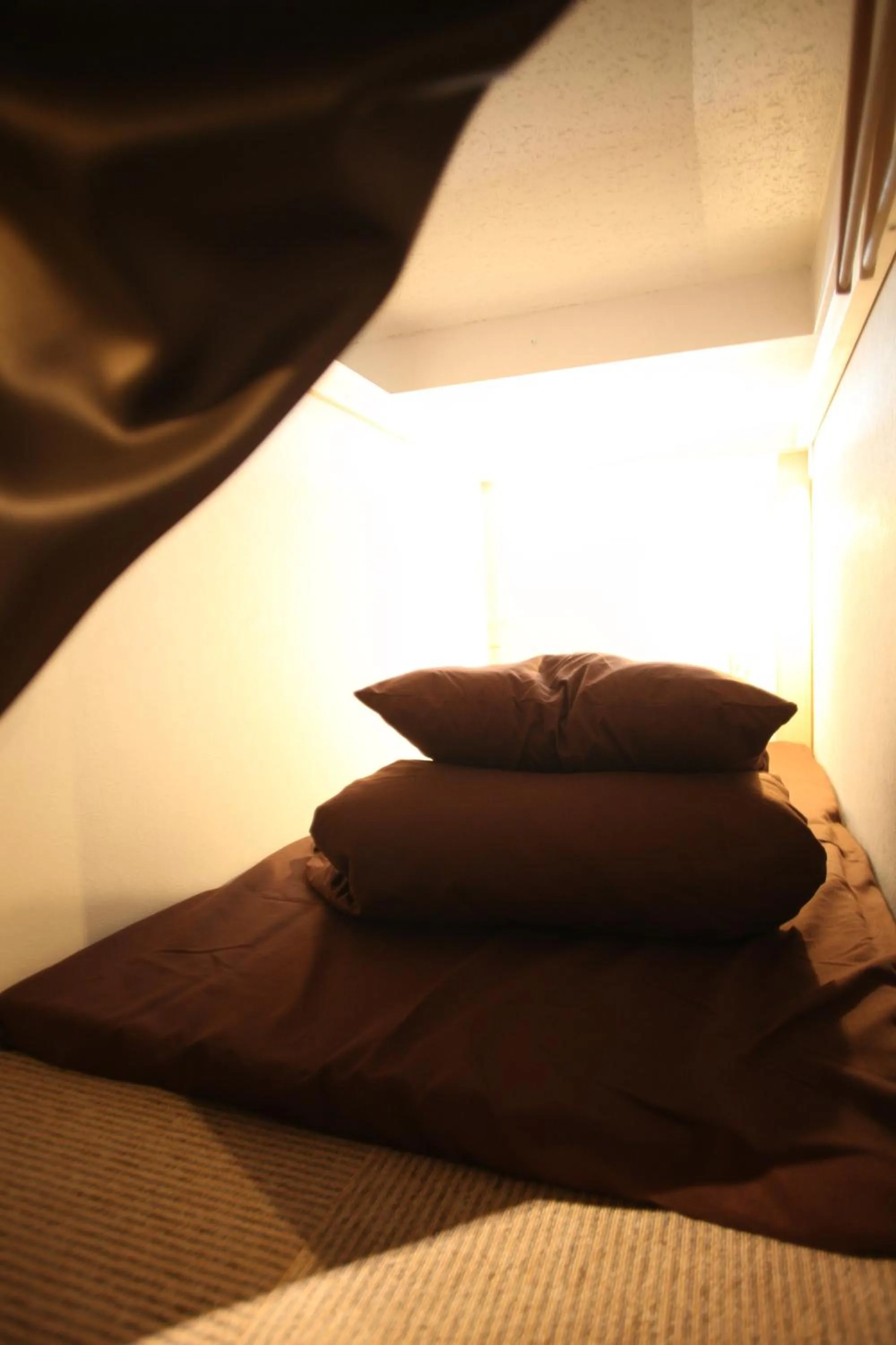 Photo of the whole room, Bed in Base Inn Tabata