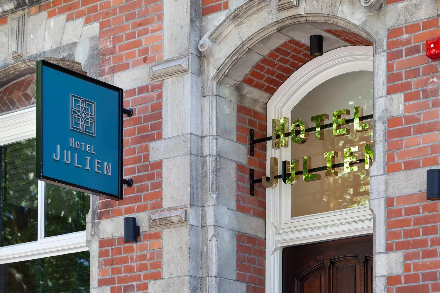 Property logo or sign in Hotel Julien