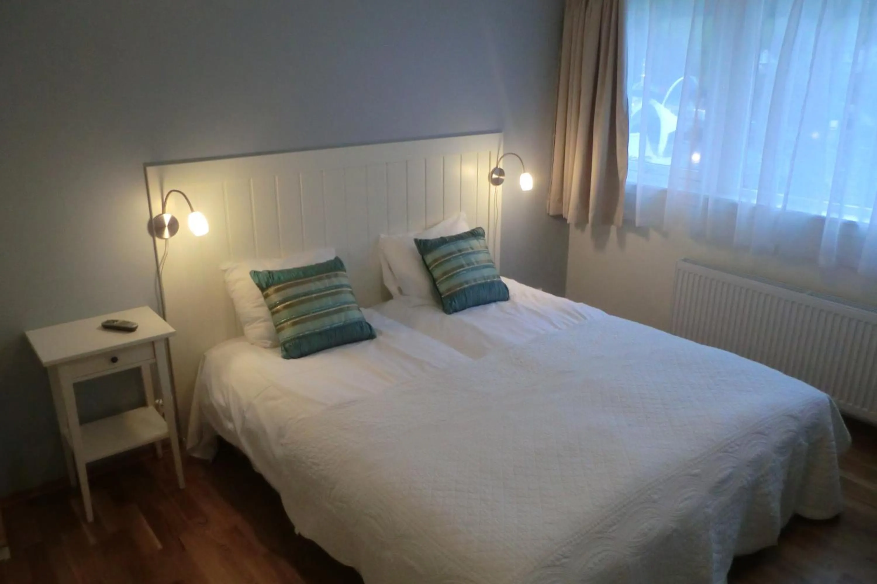 Bed in Lavik Fjord Hotel & Apartments