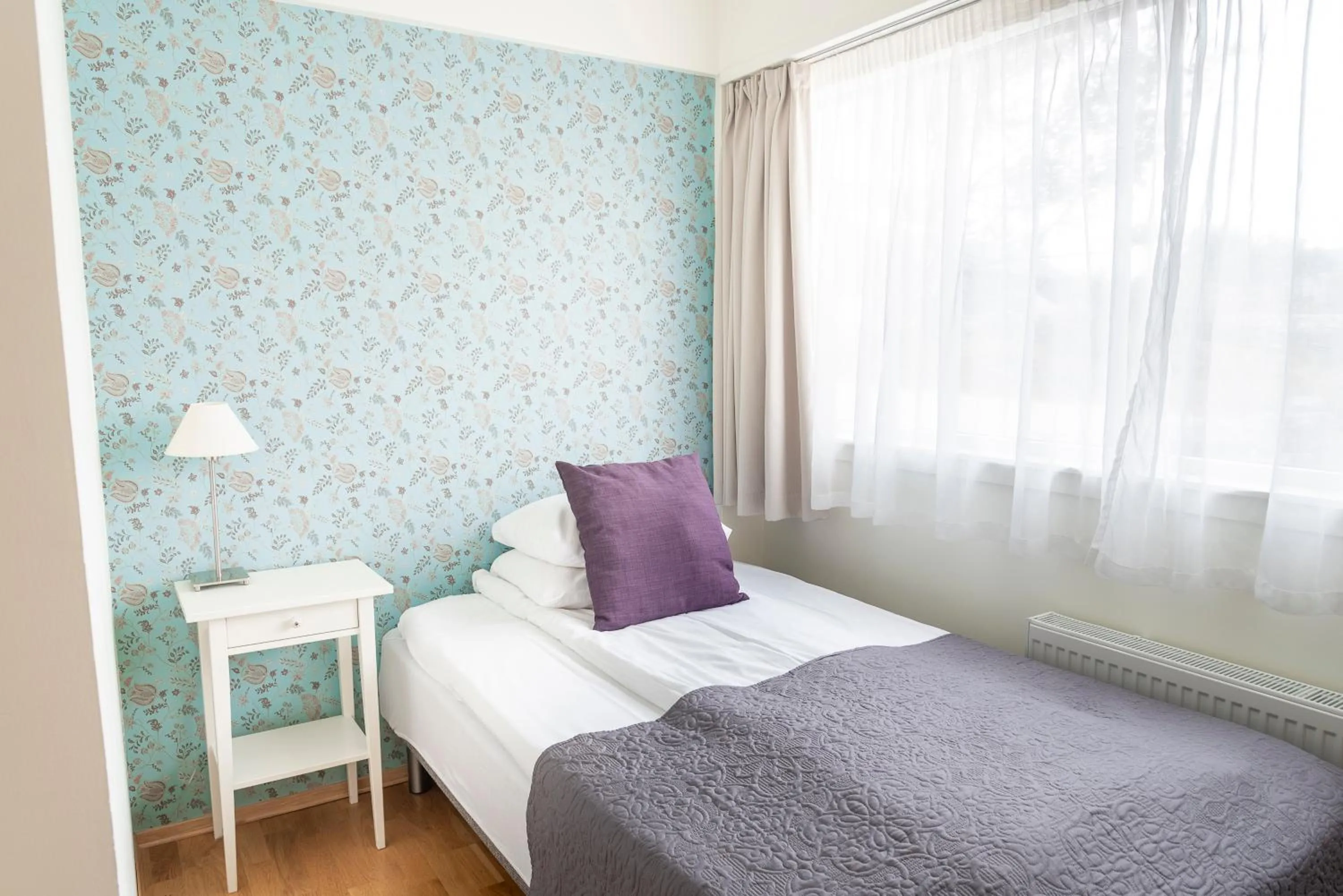 Bed in Lavik Fjord Hotel & Apartments