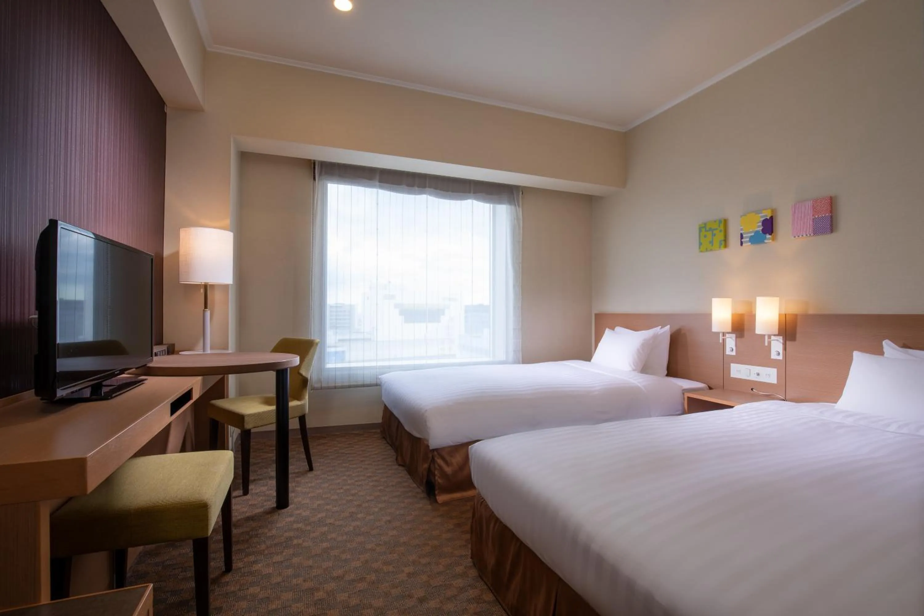 Photo of the whole room, Bed in Miyako Hotel Yokkaichi