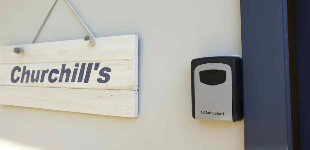 Property logo or sign in Churchill's B&B twin spa getaway Studio