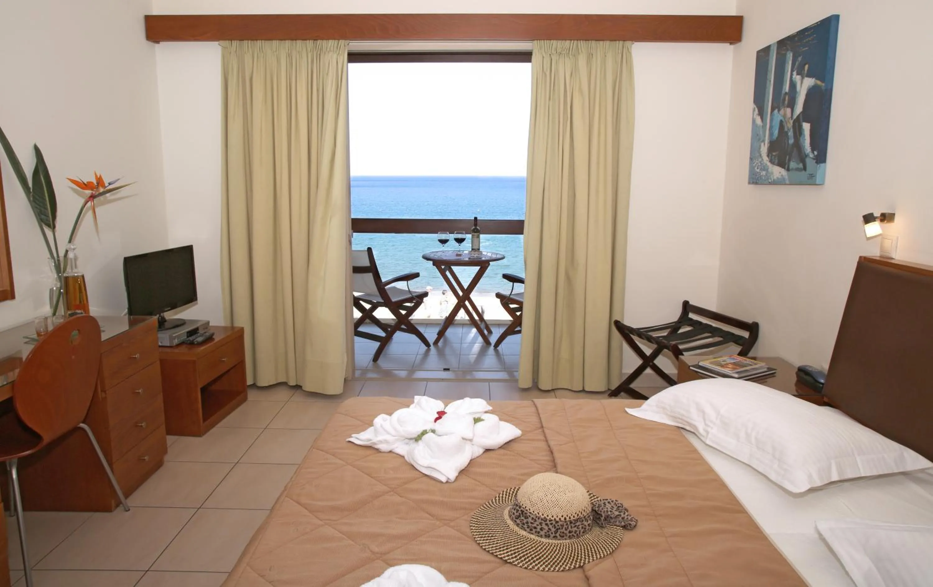 Seating area, Bed in Sitia Bay