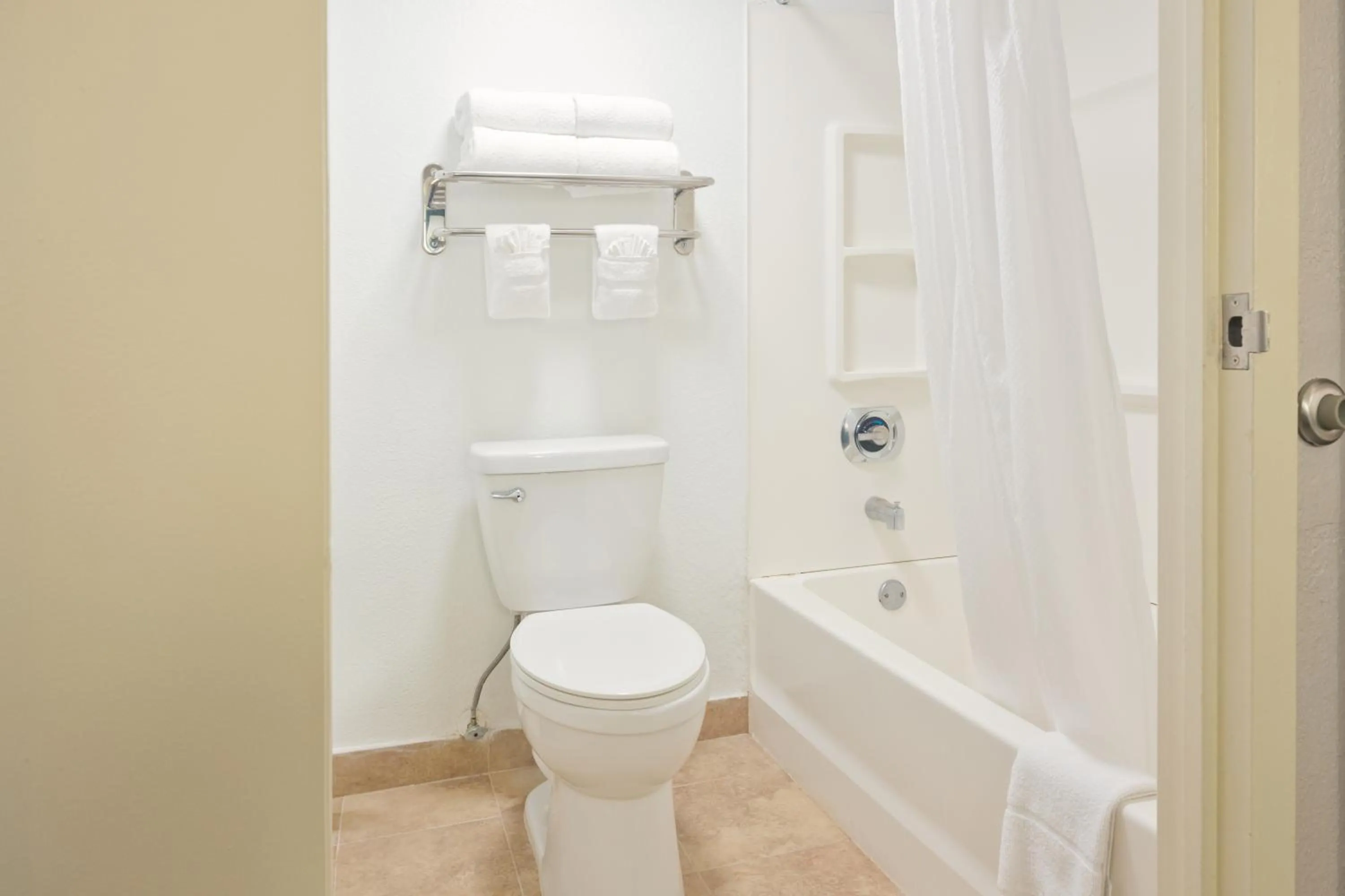 Bathroom in The Palms Inn & Suites Miami, Kendall, FL