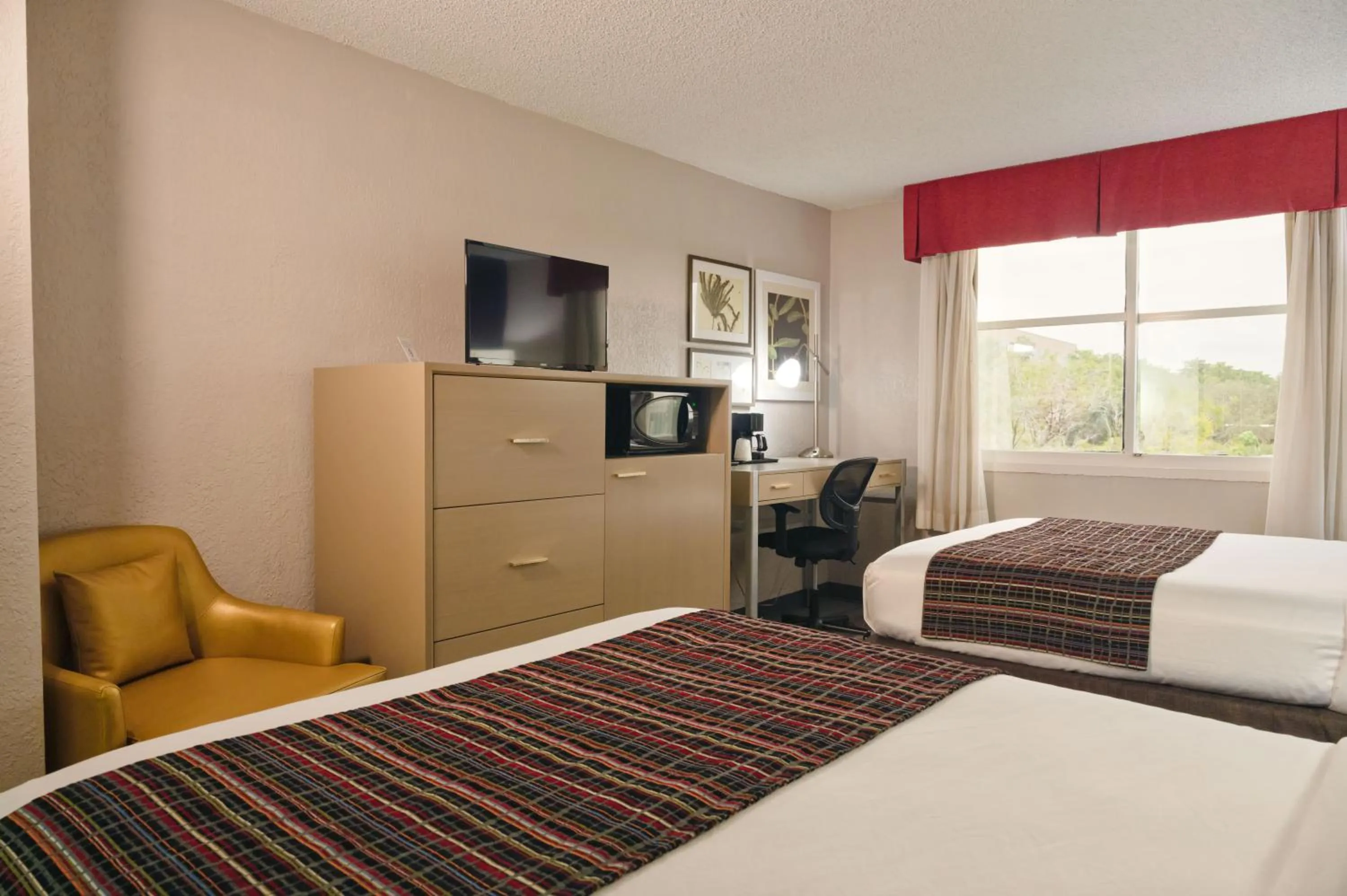 Bed in The Palms Inn & Suites Miami, Kendall, FL