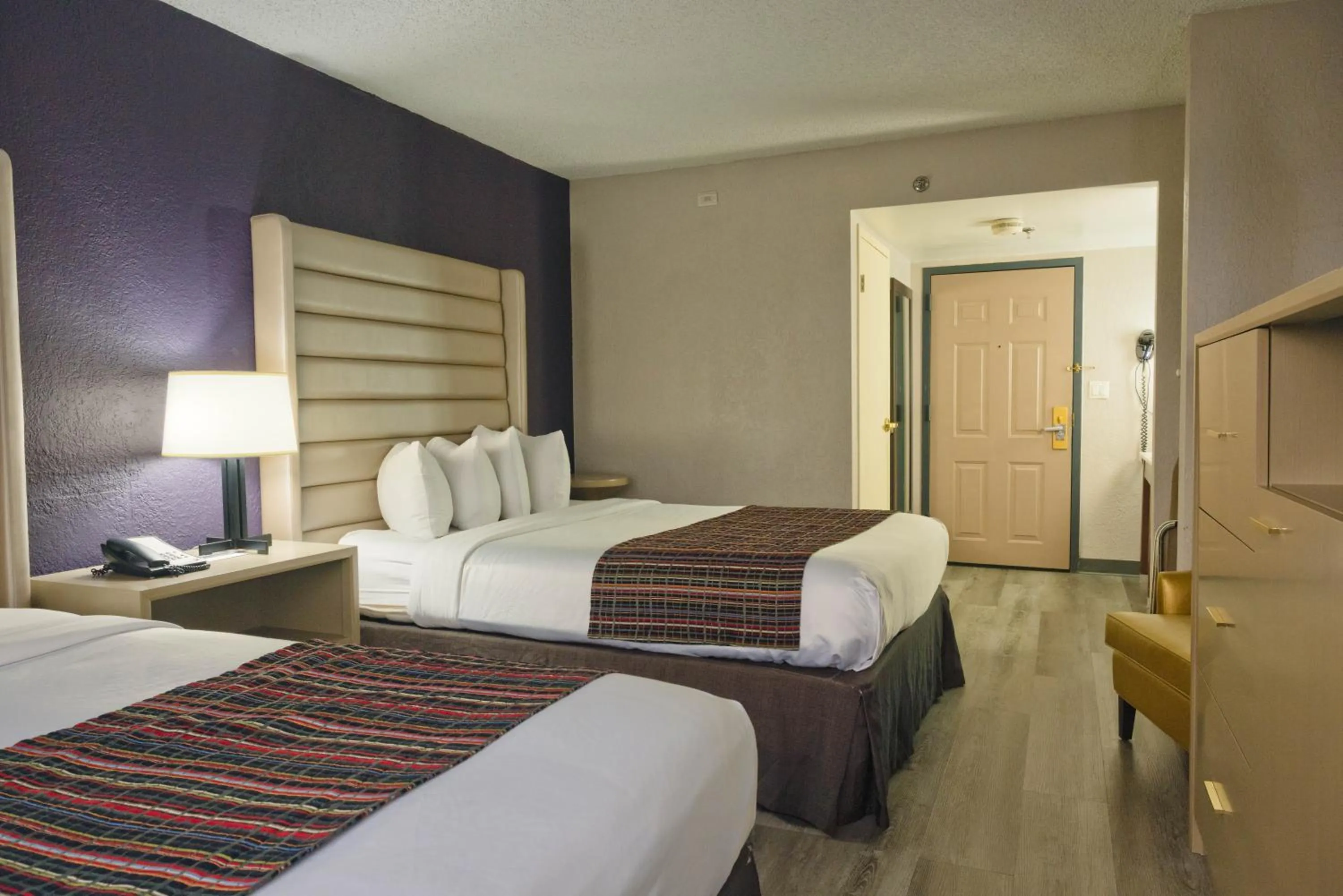 Bedroom, Bed in The Palms Inn & Suites Miami, Kendall, FL