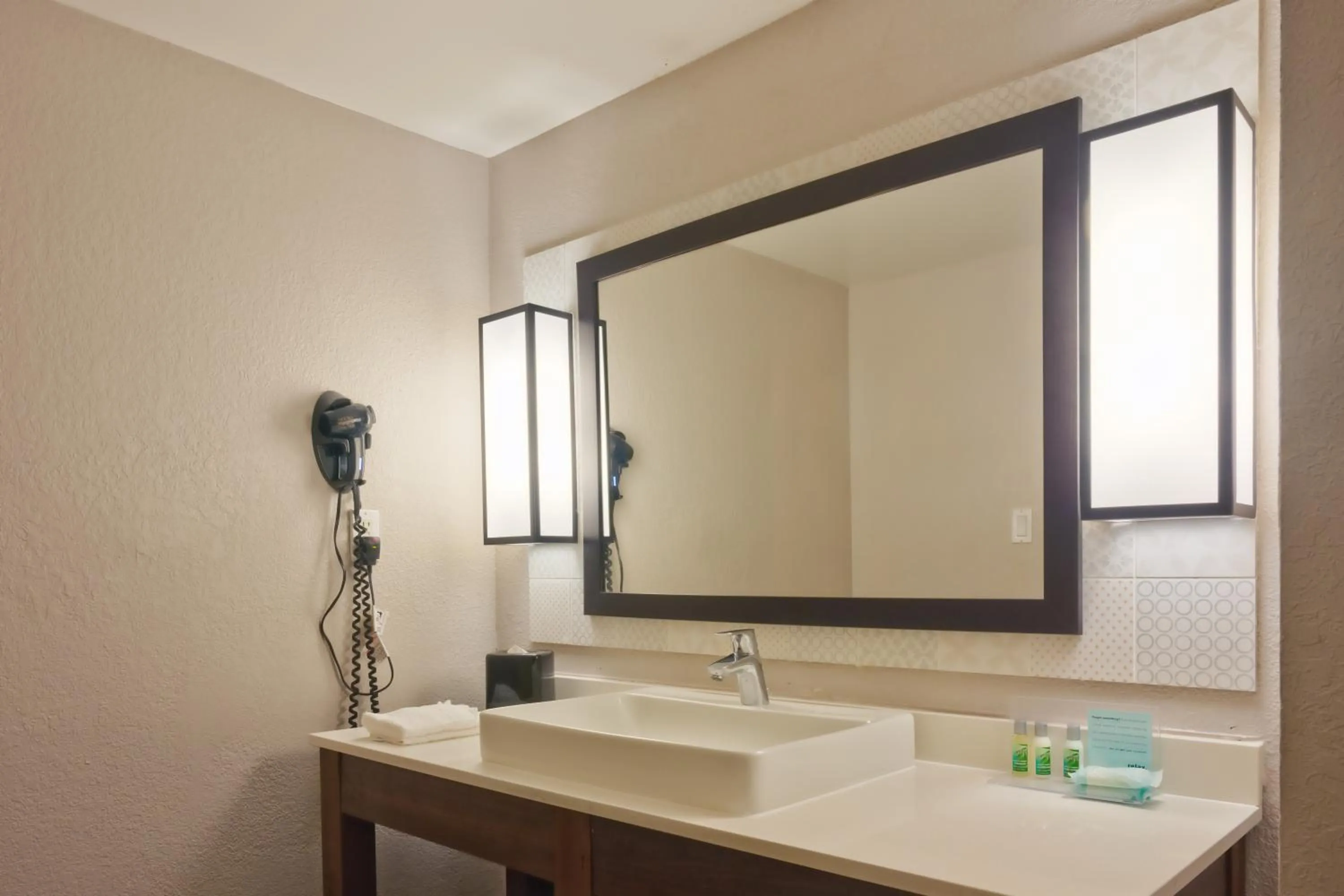 Bathroom in The Palms Inn & Suites Miami, Kendall, FL