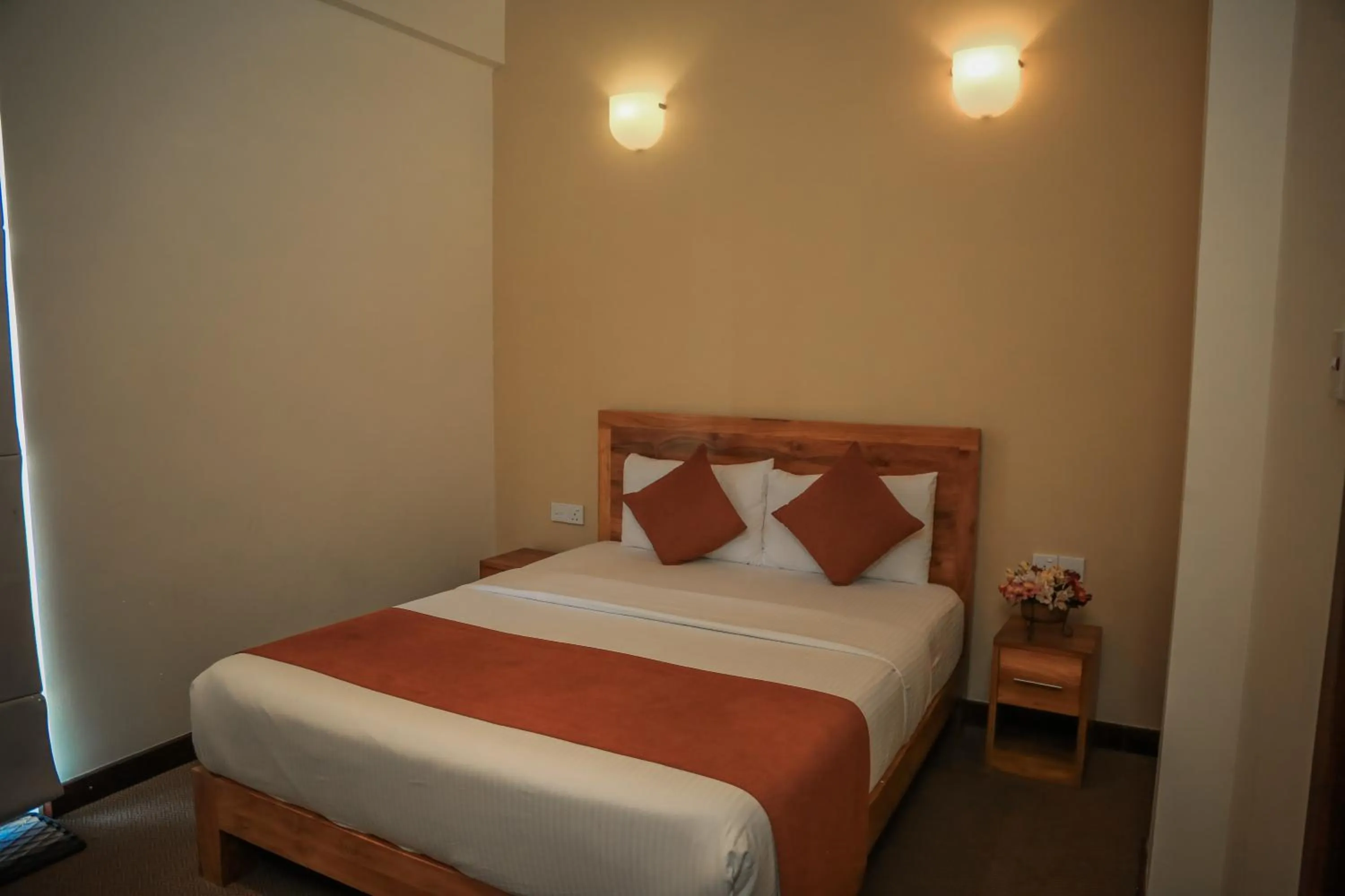 Bed in Emirates Luxury Apartments (Glen Fall Residencies)