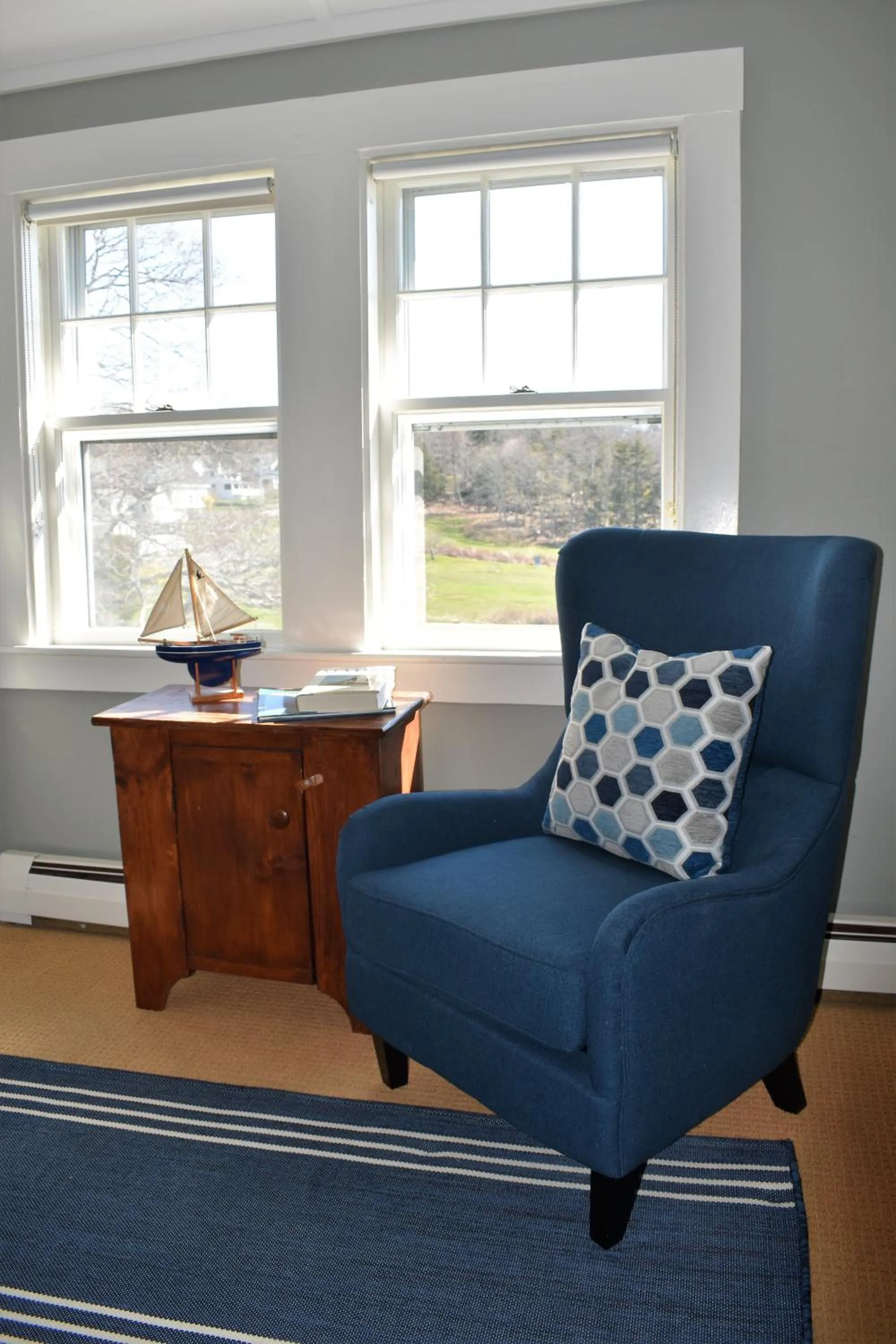 Seating area in East Wind Inn on the Water