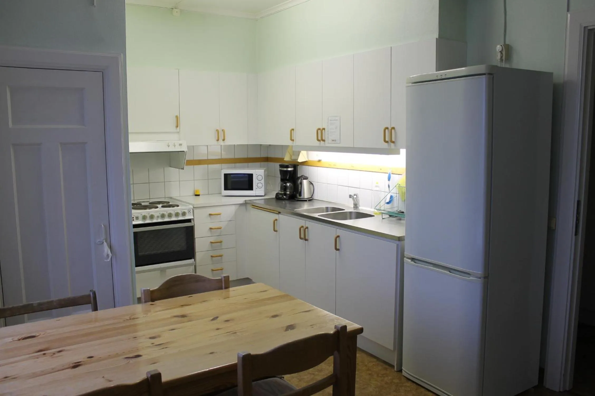 Kitchen or kitchenette in Trunna Vandrarhem & Konferens