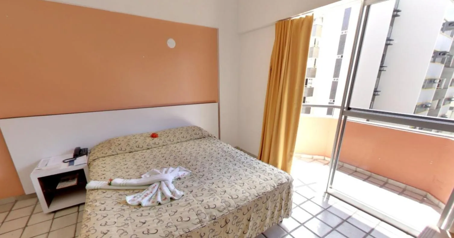 Photo of the whole room, Bed in Lagoa Mar Inn - Estacionamento e duas crianças de até 10 anos Será Free